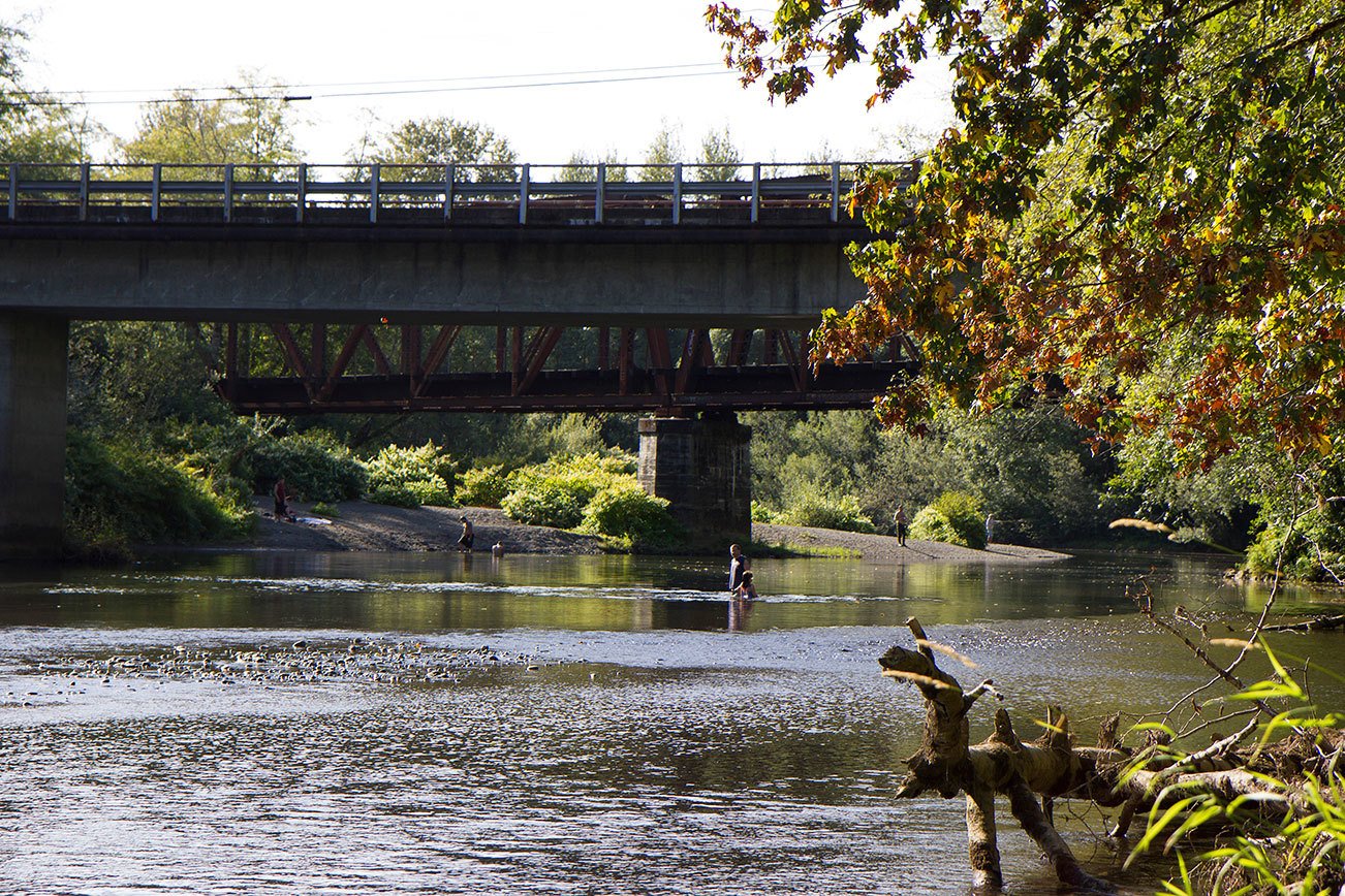 Charges filed after 4-year-old tossed from bridge to river