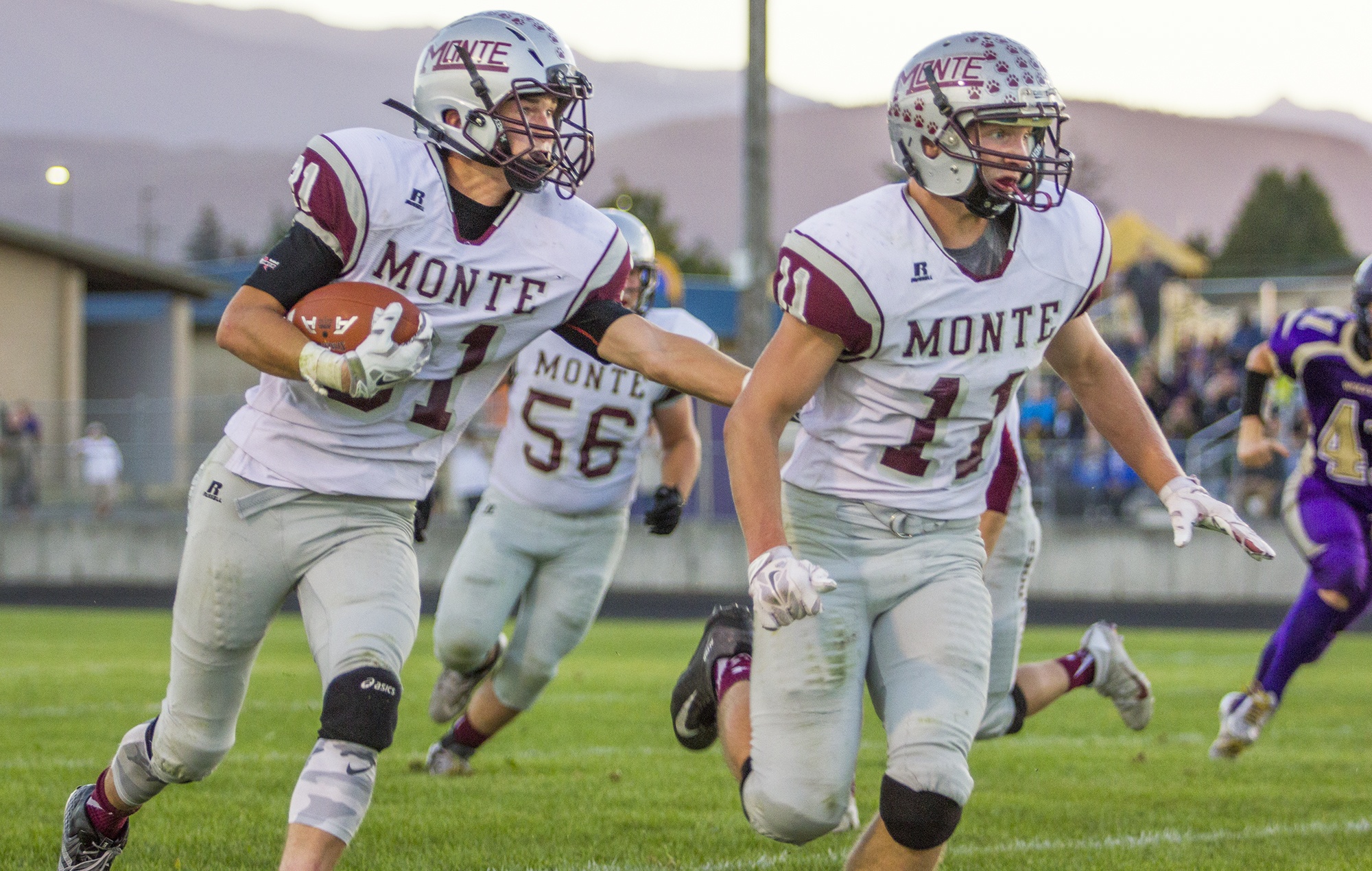 (Photo by Justin Damasiewicz)                                Montesano running back Carson Klinger runs behind lead blocker Nathan Olsen during a non-league contest against Sequim on Friday at Sequim High School.