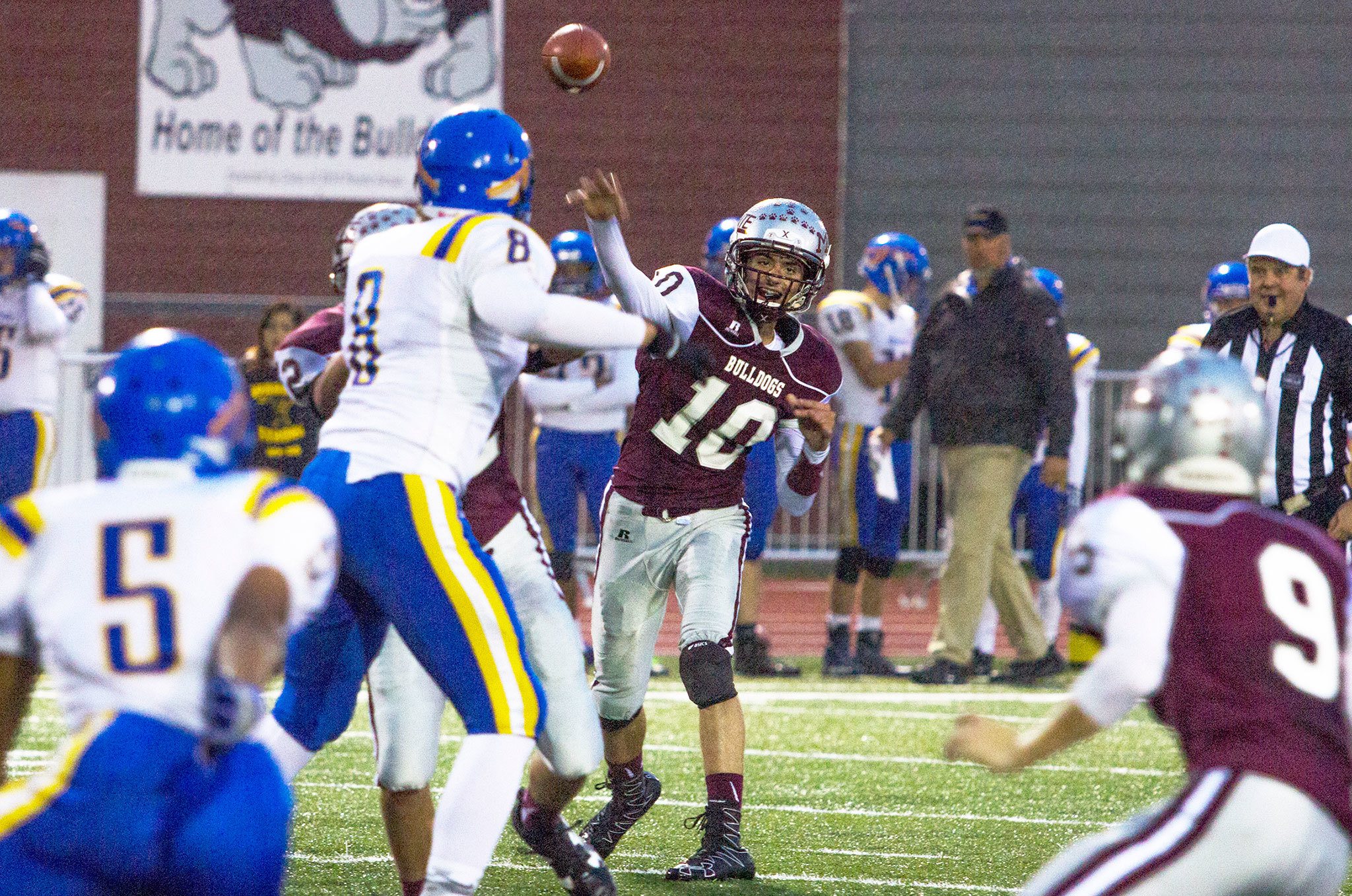 Photo by Justin Damasiewicz                                Montesano quarterback Trevor Ridgway throws a pass during a non-league game against Rochester on Friday night at Rottle Field.