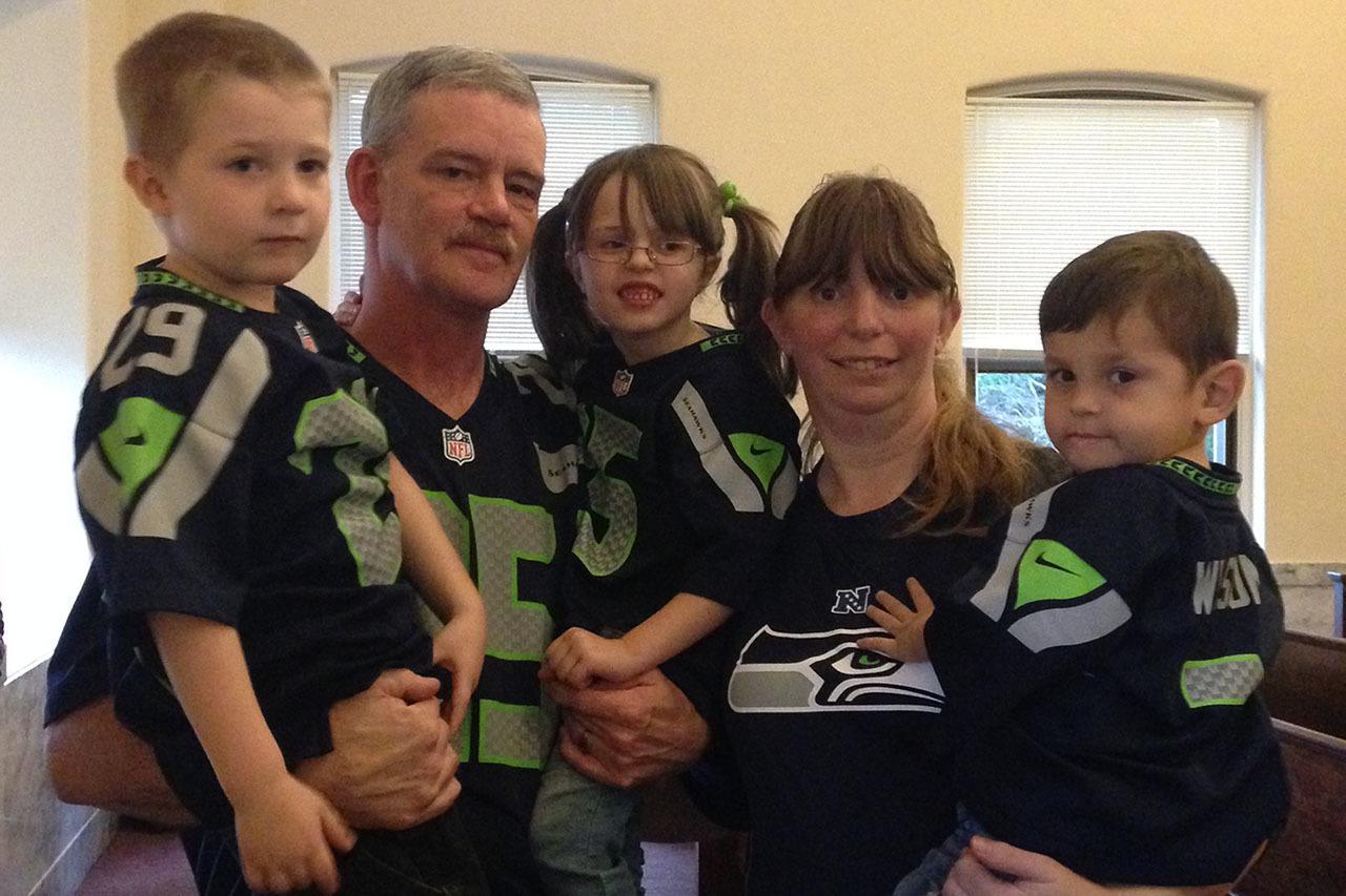 (Stephanie Morton | The Vidette)                                The Hathaways added another little person to their family when they adopted Easton on Friday, Nov. 18. From left: Charles, 5, Herb Hathaway, Jaycee, 5, Tammy Hathaway and Easton, 2. Charles and Jaycee were also adopted from foster care by the Hathaways.