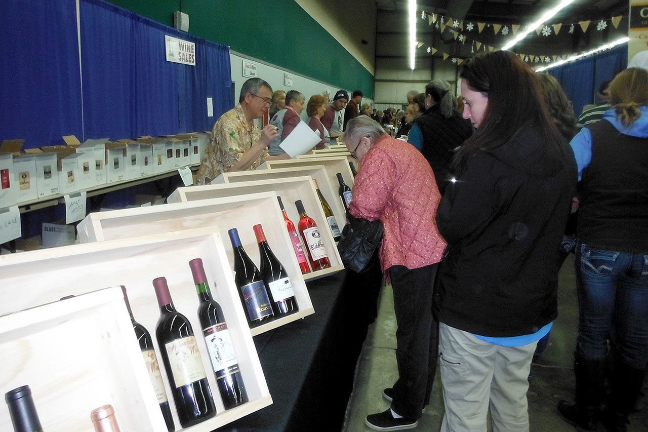 The Elma Winter Wine Festival at the Grays Harbor County Fair and Event Center gave grape enthusiasts the opportunity to sample a tremendous variety of Washington wines Saturday. When they found what they liked, they could pop over to the wine sales table and take bottles of their favorites home.