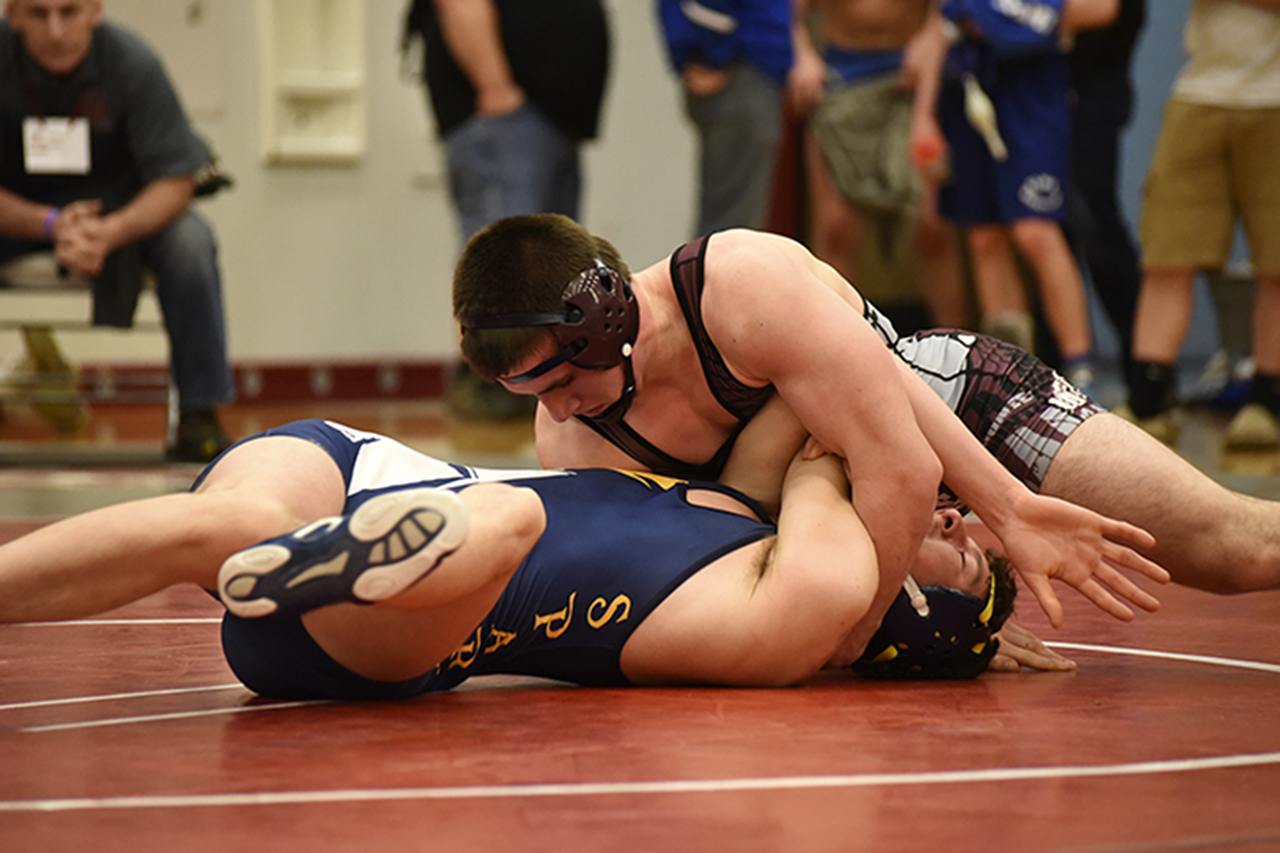 (Photo by Sue Michalak)                                Montesano senior Austin Cain recorded three pins in less than a minute on Saturday Feb. 11.