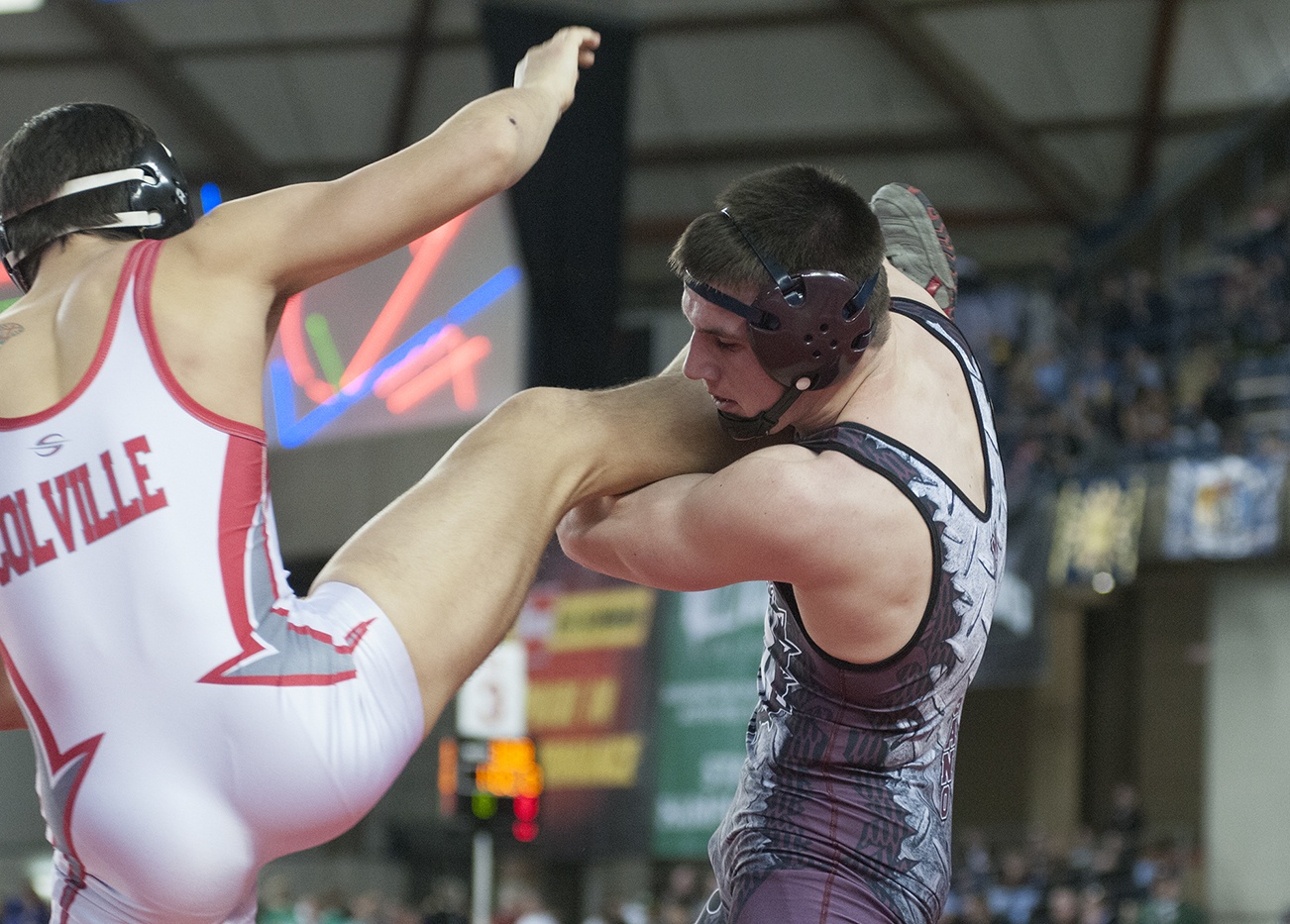 (Brendan Carl | Grays Harbor Newspaper Group) Montesano’s Austin Cain works to control the leg of Colville’s Thailer Morrison during the final on Saturday.