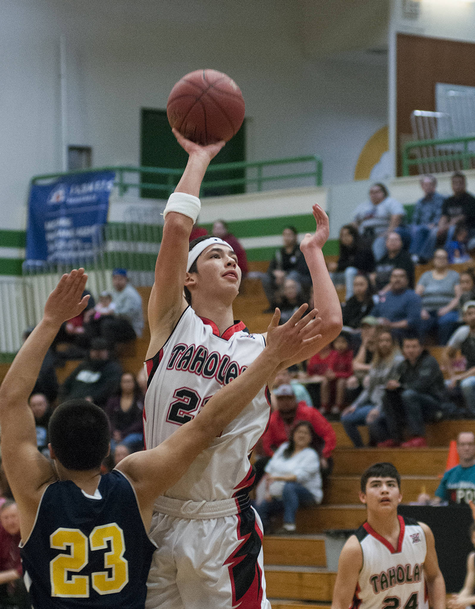(Brendan Carl | The Daily World) Taholah’s Zach Cain goes up for a shot during the state 1B regional game against Naselle in February. Cain was voted onto the 2017 Washington All-State Boys 1B first team on Monday. Montesano’s Jordan Spradlin and Hoquiam’s Jack Adams III were also honored.