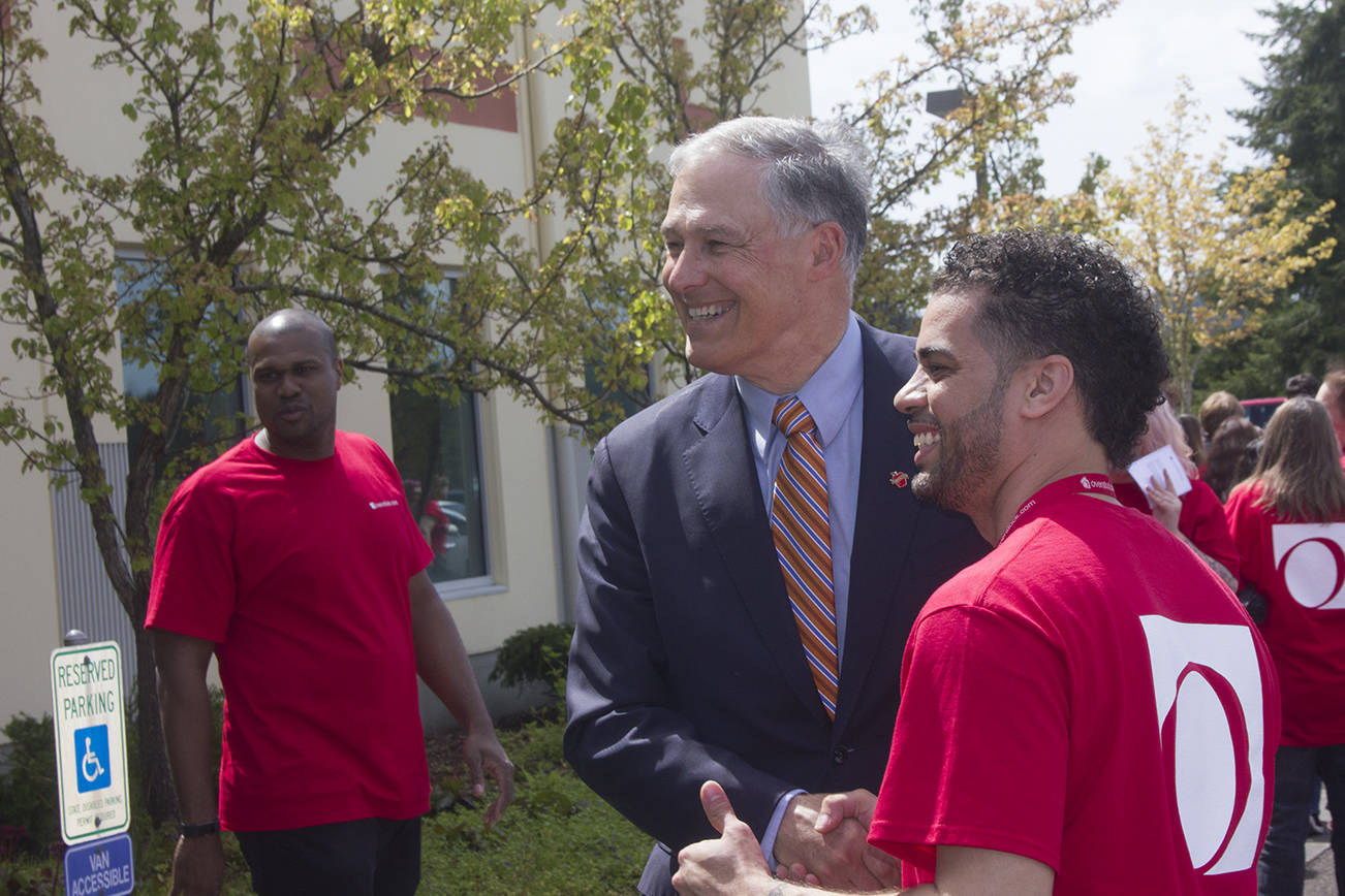 (Corey Morris | The Vidette) Gov. Jay Inslee met and took pictures with Overstock.com employees at Satsop Business Park during a ribbon cutting ceremony on May 10, 2017.