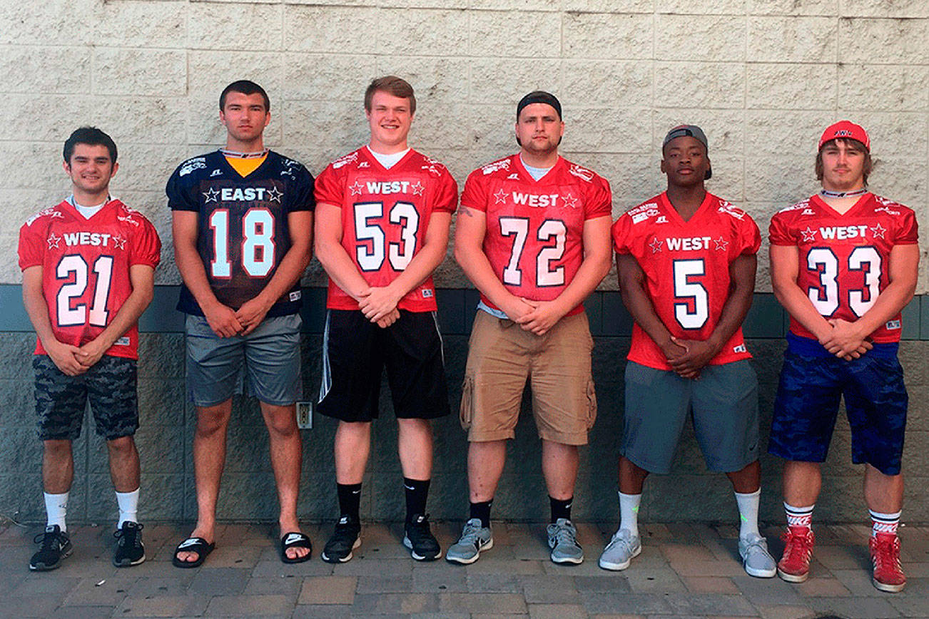 (Tom Sanchez) Six Twin Harbor high school football players participated in Saturday’s Earl Barden East-West All-Star Classic in Yakima on Saturday. The players were (from left) South Bend’s A.J. Sanchez, Aberdeen’s Braden Castleberry-Taylor, Raymond’s Luke Hamilton, Montesano’s Taylor Rupe, Hoquiam’s Artimus Johnson and Pe Ell-Willapa Valley’s Kaelin Jurek.
