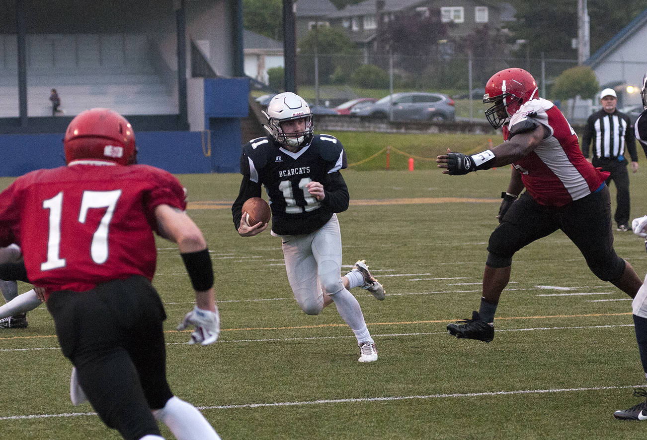 (Brendan Carl | Grays Harbor Newspaper Group) Grays Harbor’s Justin Spencer sprints away from a defender after making a catch on Saturday.