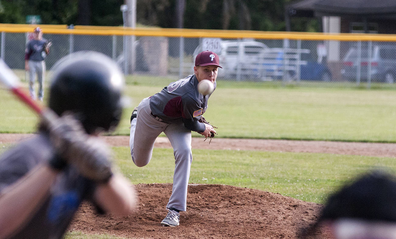(Brendan Carl | Grays Harbor Newspaper Group) Precision Pipe’s Drew Rose pitches against Elma Pharmacy on Tuesday. Rose allowed just two hits in the game and struck out nine in seven innings of work.