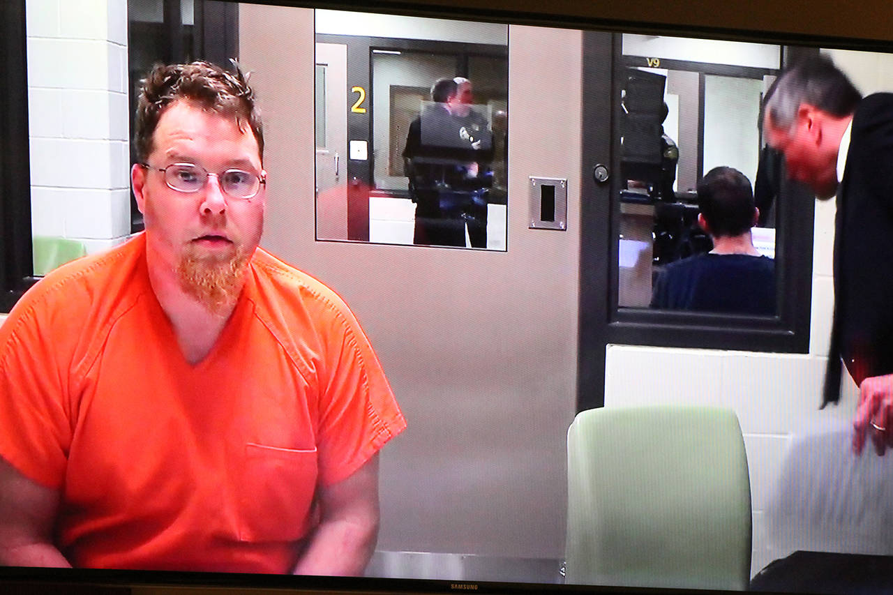 Evans gets 1 year for hanging dog