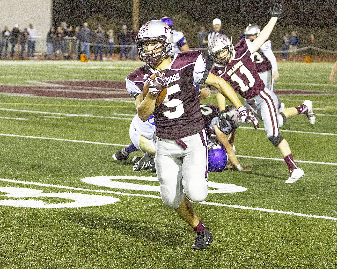 (Photo by Justin Damasiewicz) Montesano&rsquo;s Teegan Zillyett carries the ball during a non-league football game against Sequim on Friday, Sept. 9 at Rottle Field.
