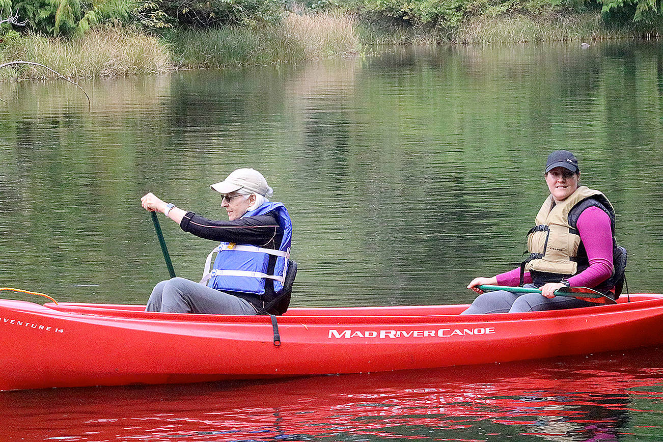 (Travis Rains | The Vidette) Maddy Hutter (left) and daughter, Rachael Snow, both of Portland, try their hands at canoeing for the first time at the Lake Sylvia Fall Festival.