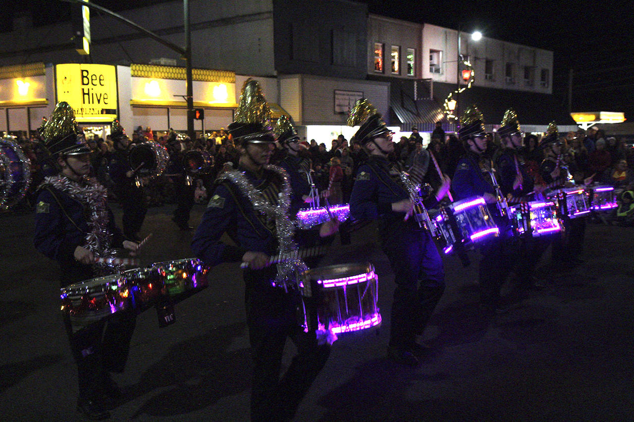 (Corey Morris | The Vidette) Drummers from the Sumner High School band, senior Jack Stark, junior Ethan Abel, senior Finn Payton and junior Austin Smith. When they played their drums, the lights lit up in a dazzling display.