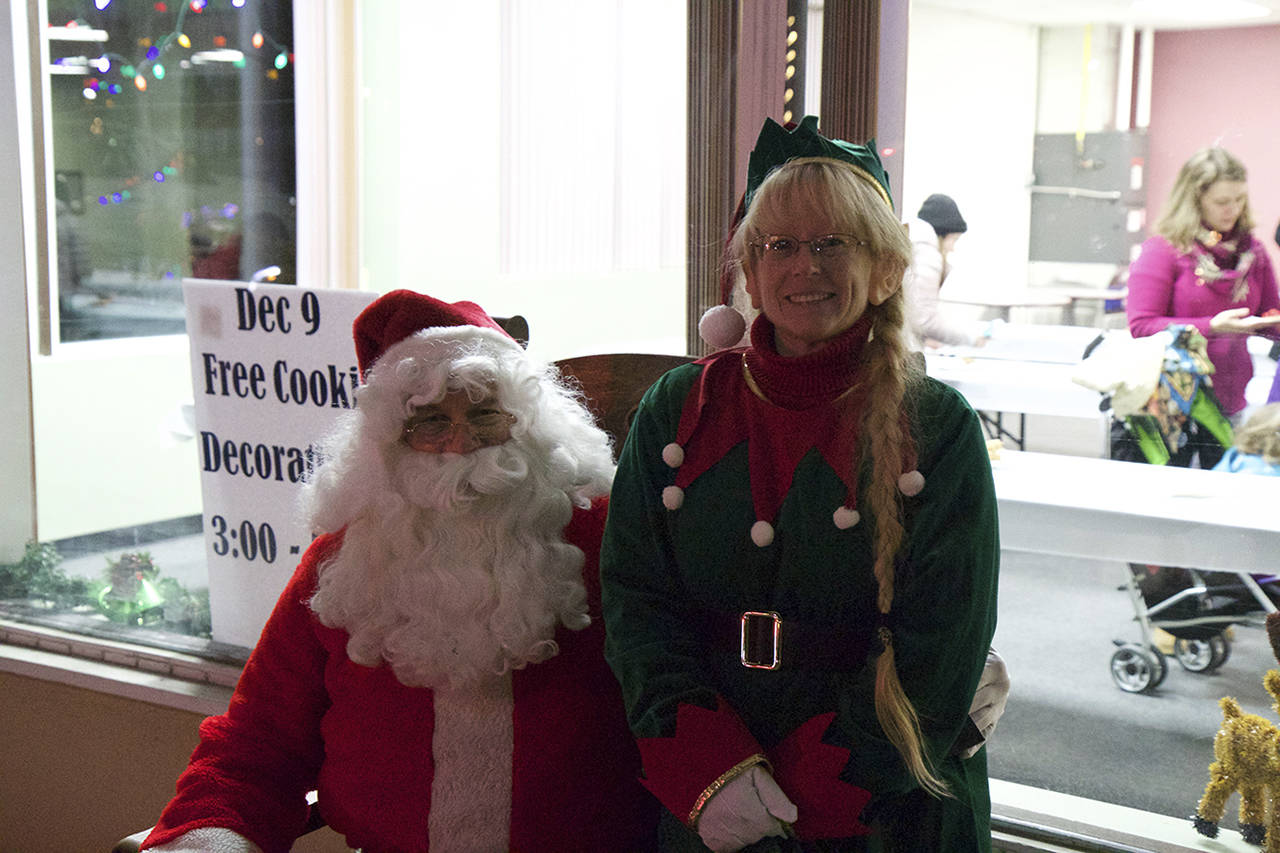 (Corey Morris | The Vidette) The Independent Order of Odd Fellows hosted Santa and his elf on Dec. 9. Santa met with children before the Festival of Lights grand parade got underway.