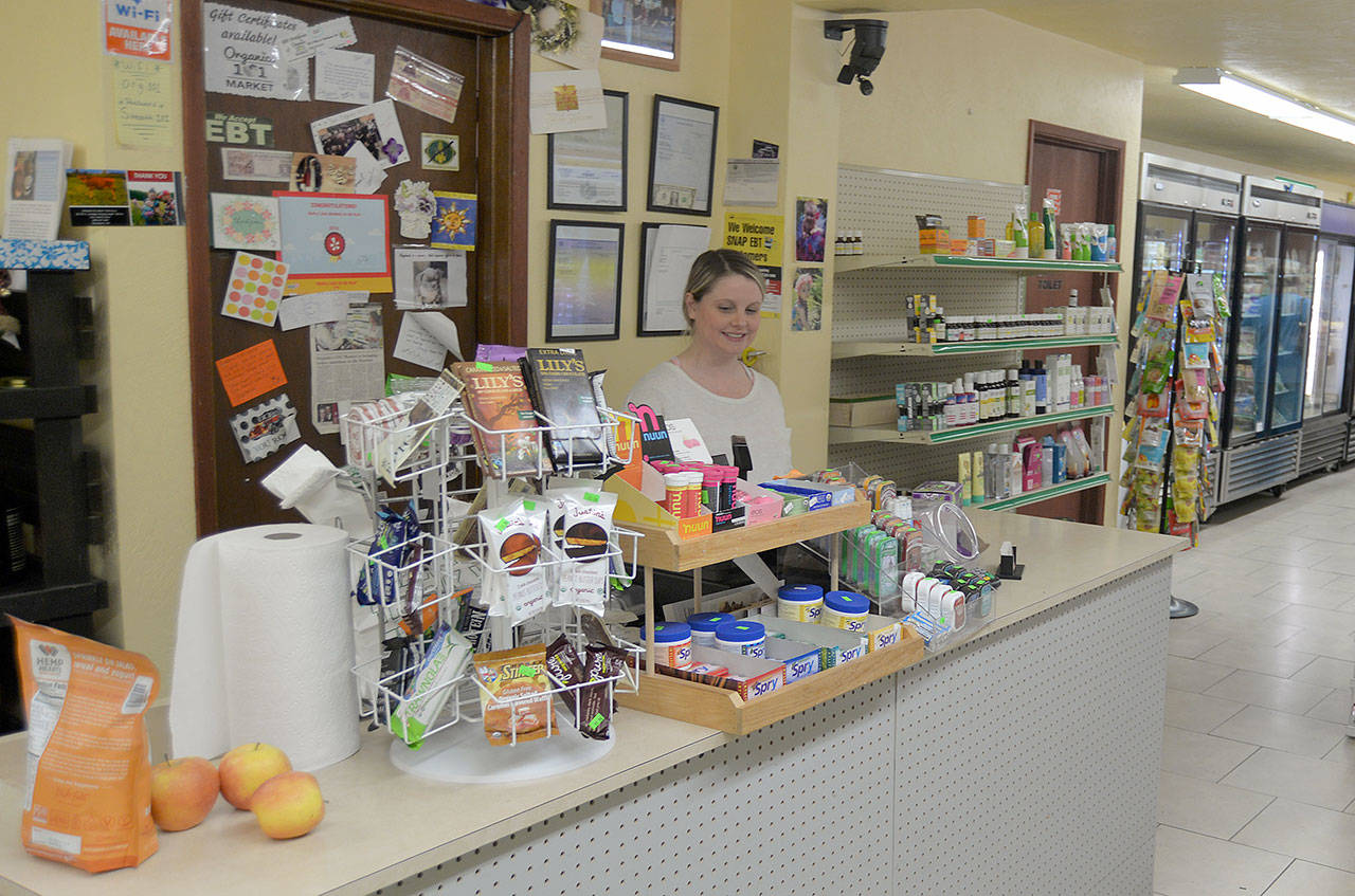 LOUIS KRAUSS | THE DAILY WORLD Organics 101 Market and Smoothie Bar owner Michelle Hutchinson stands in her store in Montesano. She acknowledged the financial hit of higher minimum wage but supports giving workers better salaries.