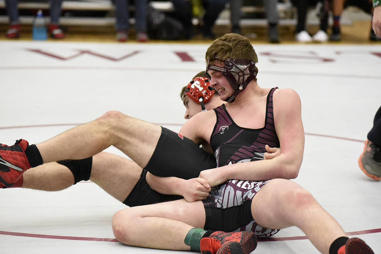 Twin Harborites produce 18 titles at subregional wrestling