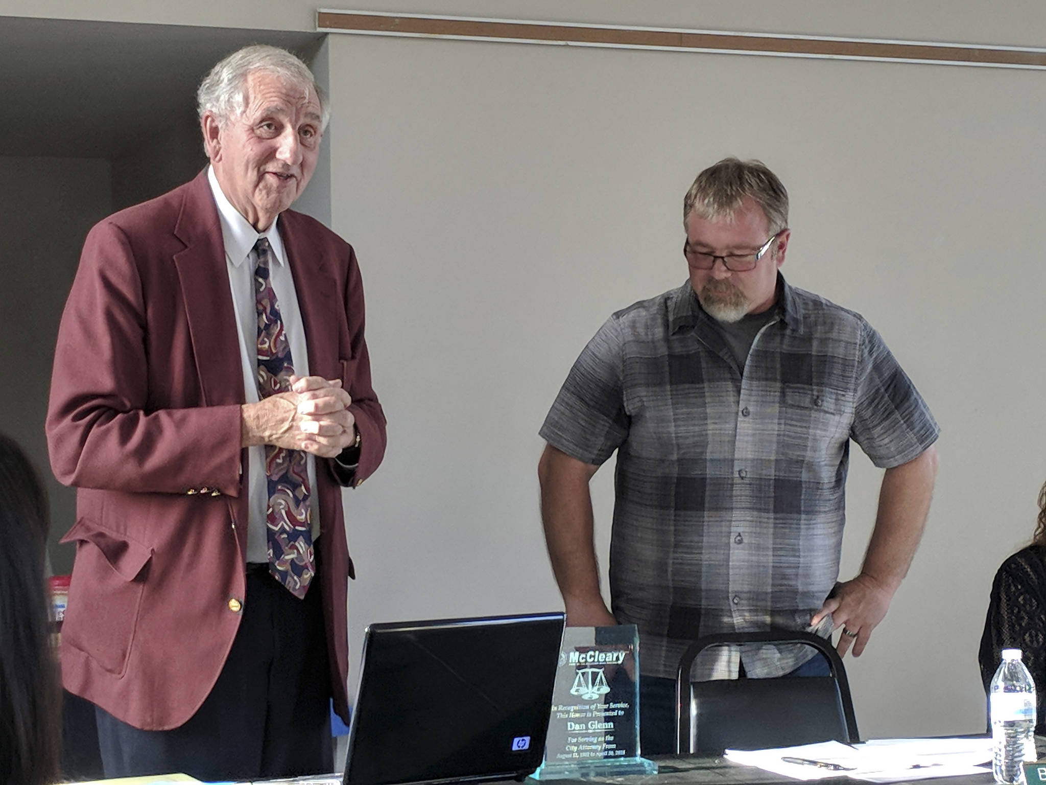 (Corey Morris | The Vidette) City attorney Dan Glenn, left, was lauded for his years of service during a recent McCleary City Council meeting.