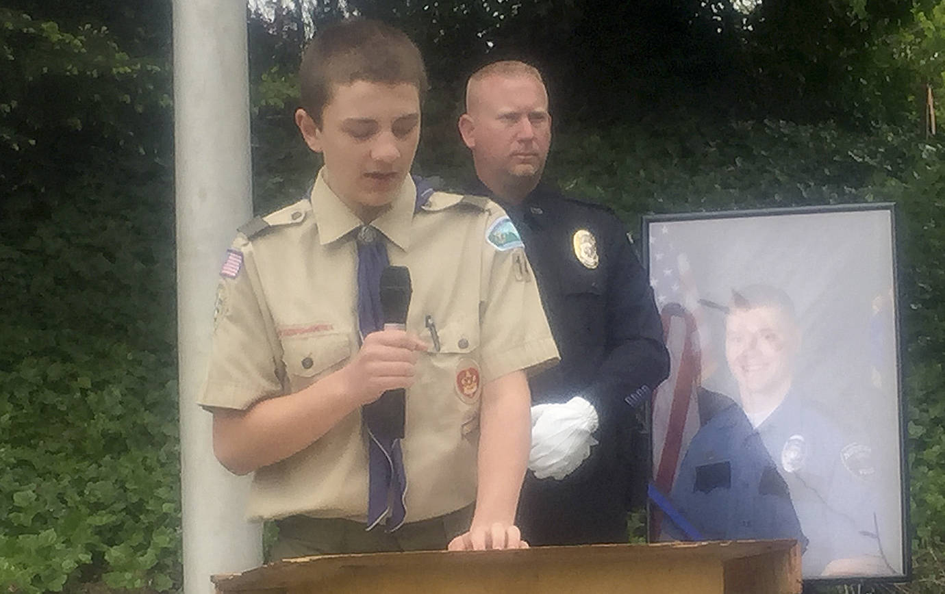 JEFF MYERS | HOQUIAM POLICE DEPARTMENT                                Elma Troop 14 Eagle Scout candidate Matt Kimbrel speaks at the dedication of a first responders memorial in Elma Wednesday afternoon. The memorial is the Eagle Scout project for both Kimbrel and fellow candidate Evan Werner. Behind Kimbrel is Elma Police officer Josh Wheeler.