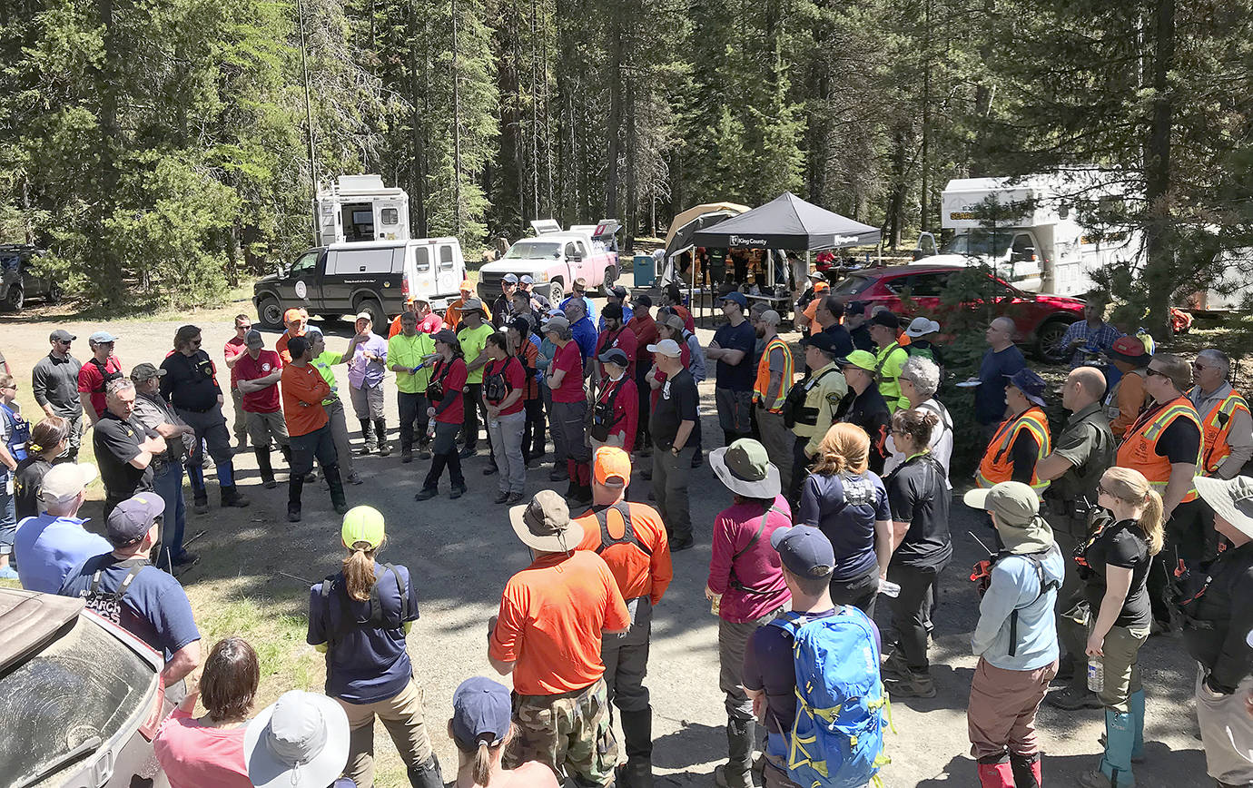 KITTITAS COUNTY SHERIFF’S OFFICE PHOTO                                Investigators and searchers gather near the site where Lindsey Baum’s remains were found in western Kittitas County near Ellensburg. Dozens of investigators from 10 different agencies searched the site, about 20 miles west of Ellensburg, May 12, using K9 units and search and rescue personnel to scour the area for evidence in the abduction and murder of Baum, who went missing in 2009 at the age of 10 while walking home from a friend’s home in McCleary. The search area is vast and rugged and will require additional searches, according to Grays Harbor County Sheriff Rick Scott. Searches are being coordinated by the Kittitas County Sheriff’s Office.