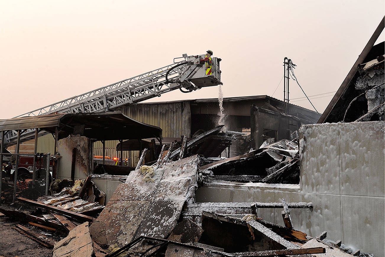 Roof collapses on Harbor Saw building