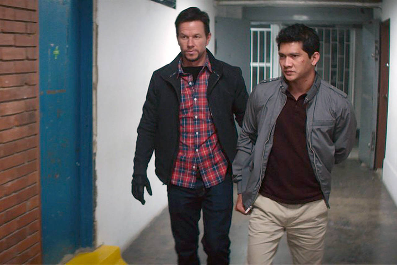 STX Entertainment                                Mark Wahlberg and Iko Uwais appear in “Mile 22.”