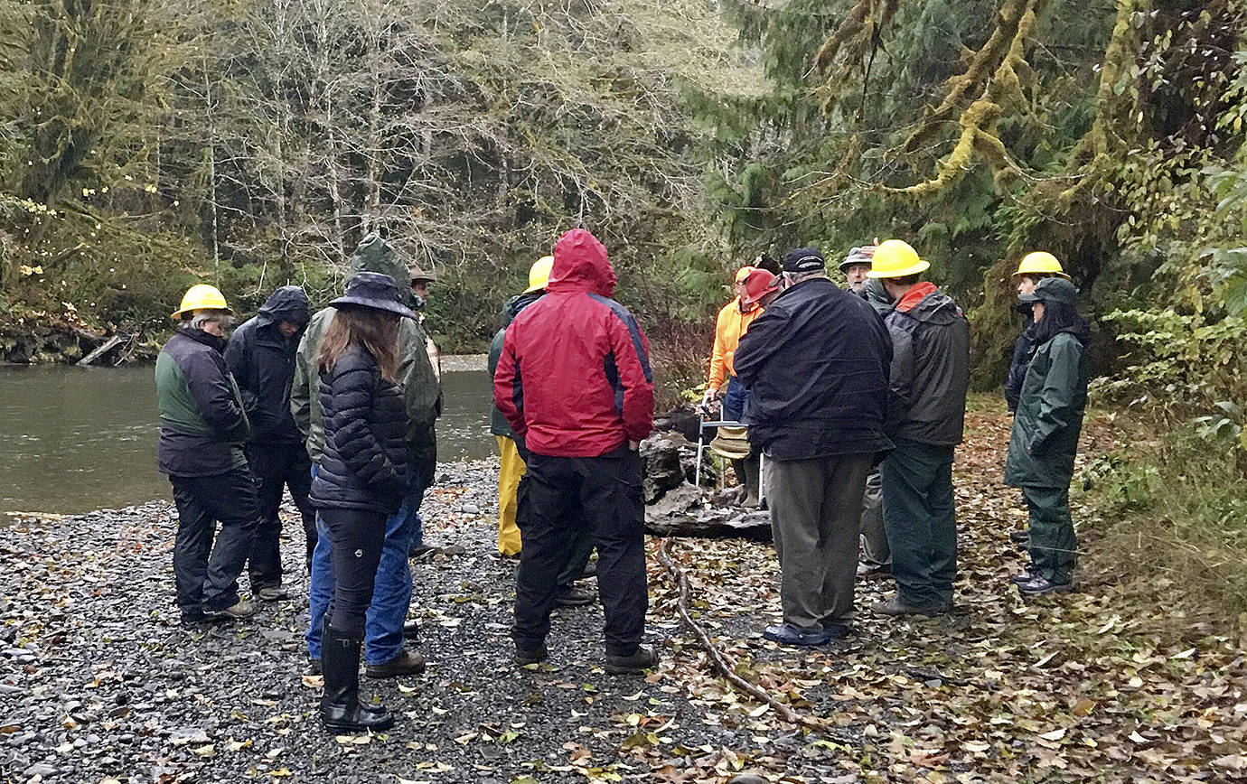 Courtesy photo                                Members of the Olympic Public Access Coalition take a tour of the Rainbow Creek access point on the West Fork of the Humptulip River. Outings like this give coalition members a chance to interact with Forest Service decision-makers on issues of access to public lands.