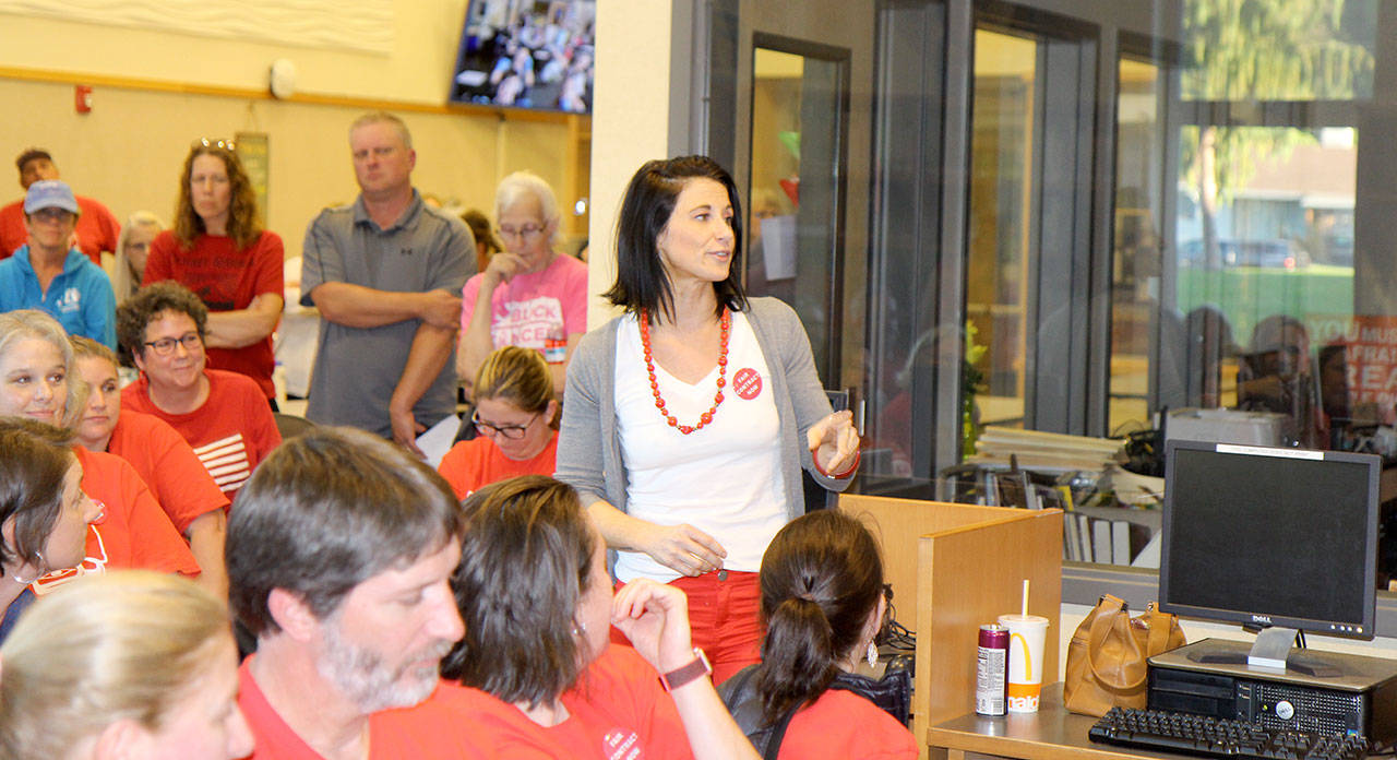 Simpson Elementary fifth-grade teacher Emily Egger, center, speaks to the Montesano School Board during it’s meeting, Thursday, Sept. 27, in her school’s library in Montesano. Photo by Michael Lang, Grays Harbor News Group