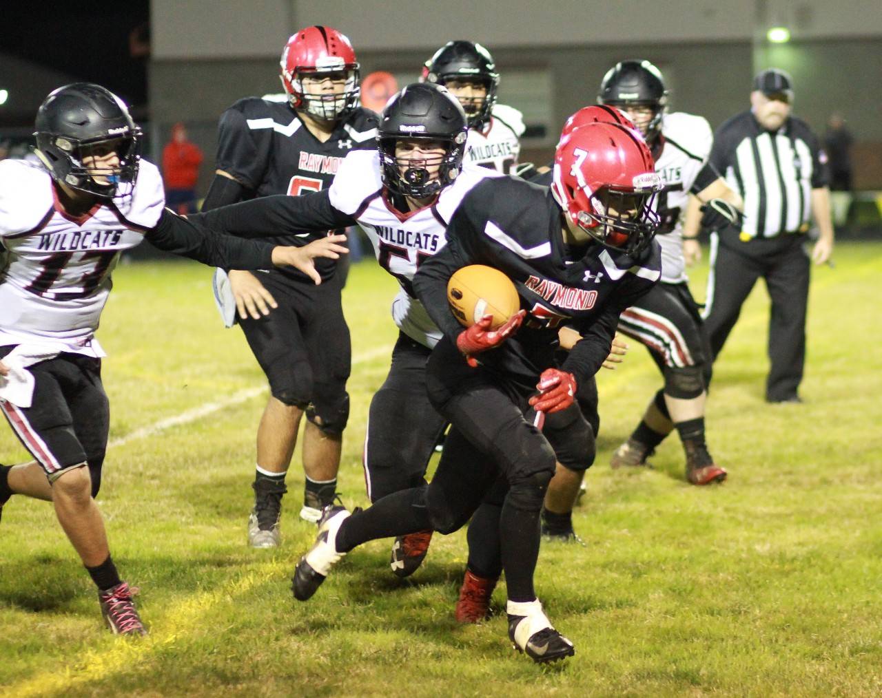 Raymond running back McCartney Maden runs against the Ocosta Wildcats on Friday. Maden had 155 rushing yards and four touchdowns in the Raymond victory. (Photo by Larry Bale)