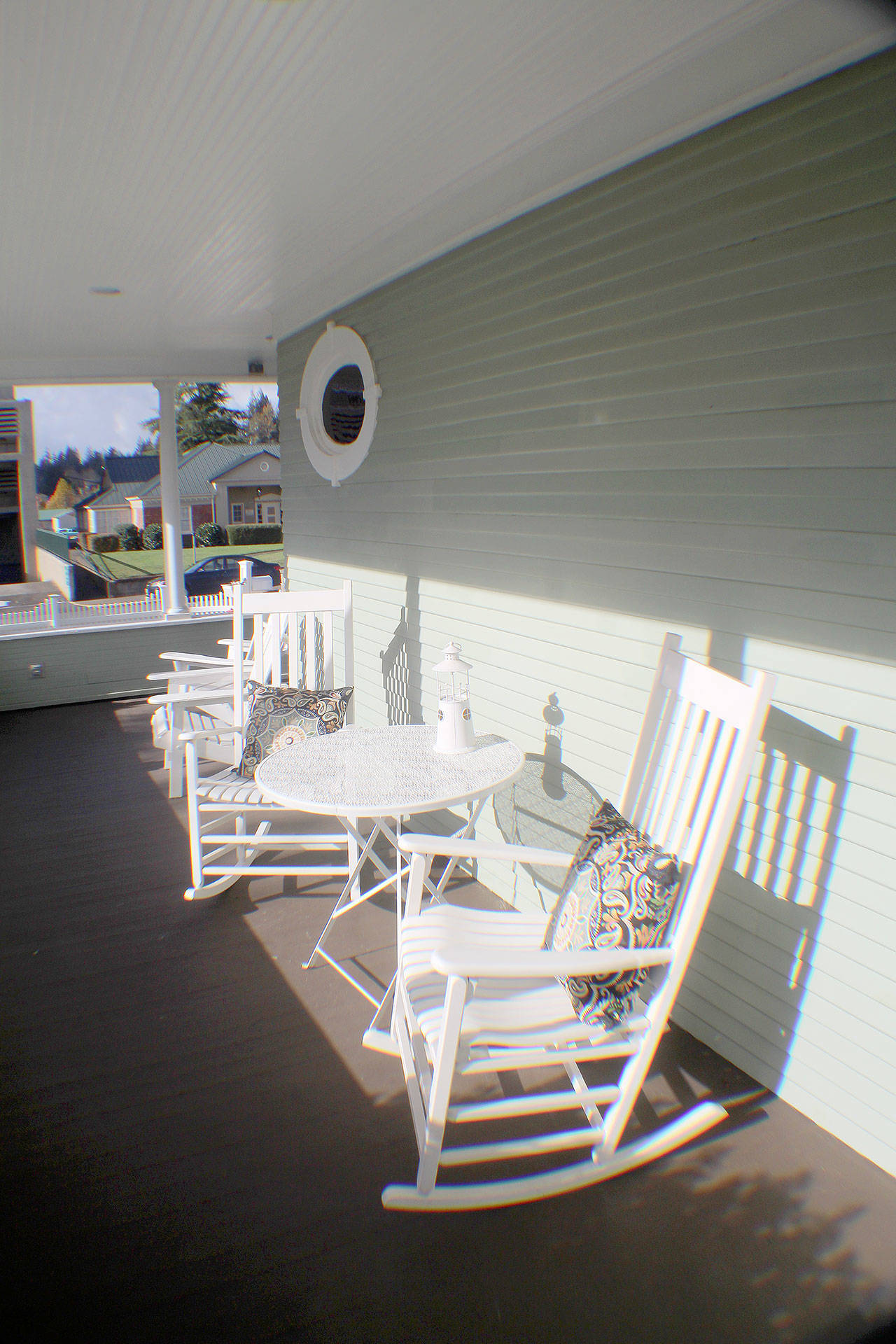 The sun shines on chares on the wrap-around porch Nov. 2 at the Montesano Inn in Montesano. Photo by Michael Lang | Grays Harbor News Group