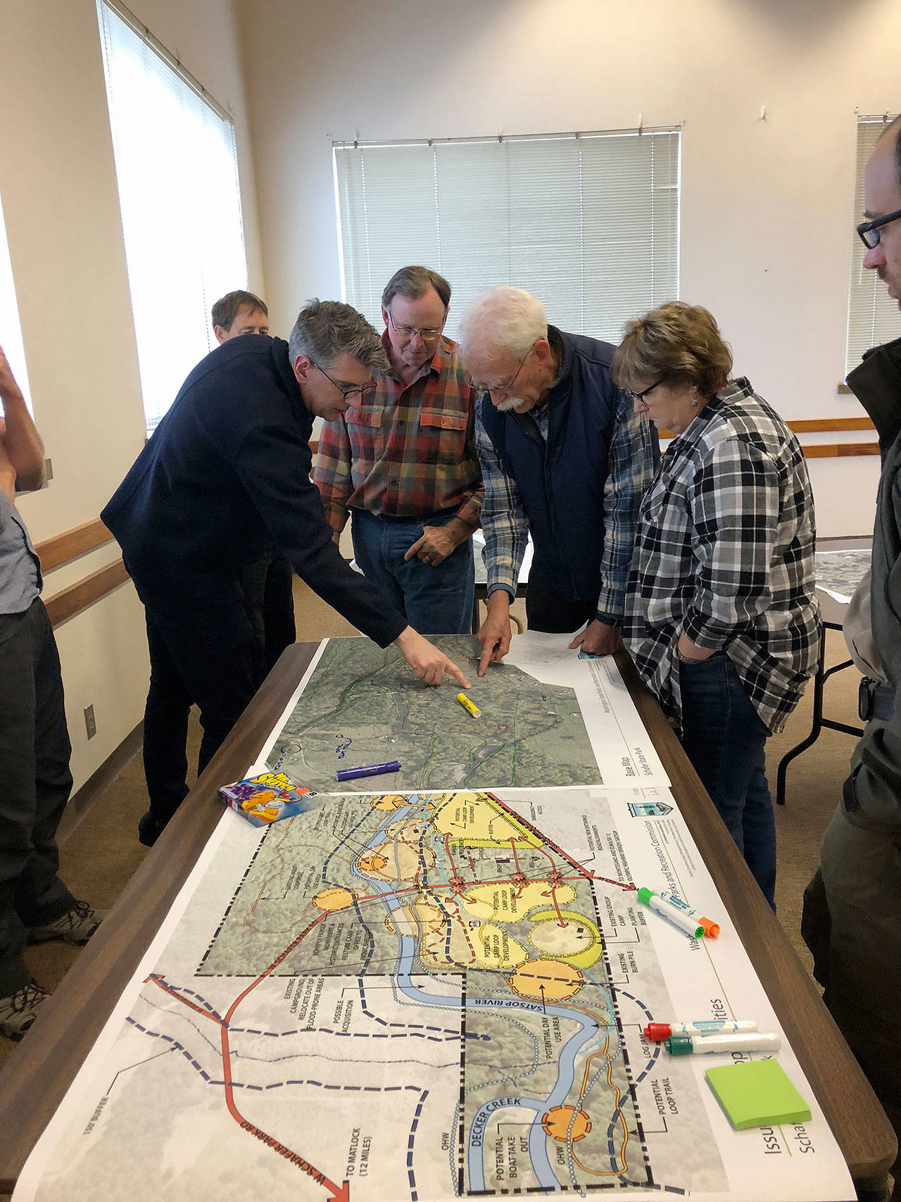 Photo courtesy Helen HeppFrom left, Michael Hankinson, a parks planner with Washington State Parks; Mike Sinclair; Stet Palmer; and Trina Young discuss possible improvements that could occur at Schafer State Park during a meeting Nov. 1 at Montesano City Hall. The agency will spend up to about $4 million over 10 years to help improve the park and habitat along the Satsop River.