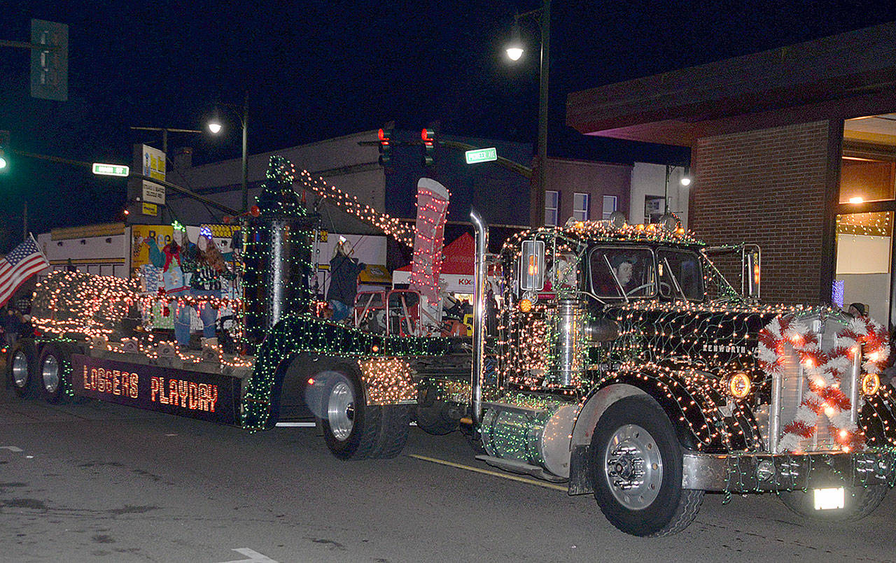 DAN HAMMOCK | GRAYS HARBOR NEWS GROUP The Montesano Festival of Lights parade best of theme award went to the Loggers Playday entry Saturday.