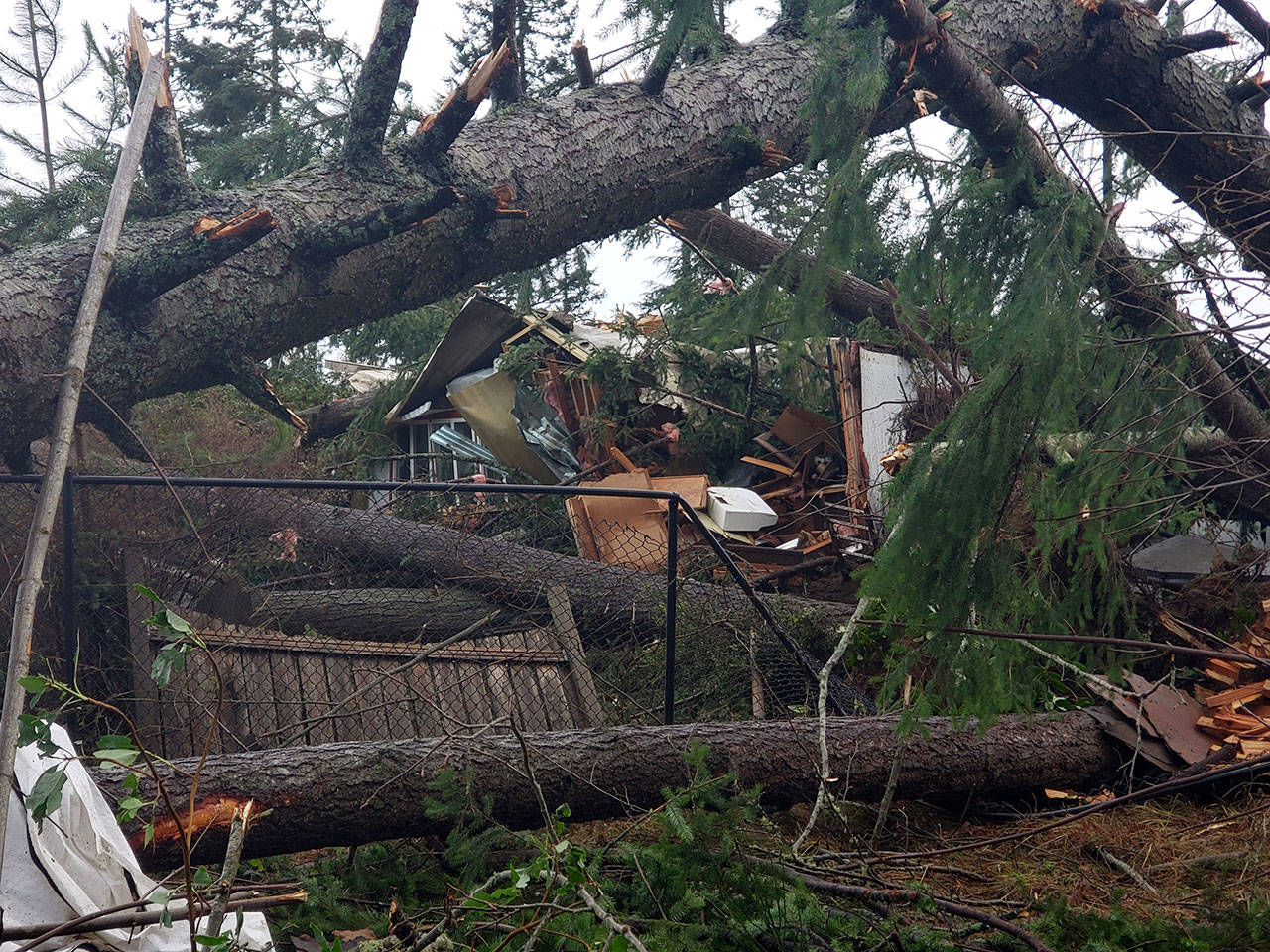 Homes behind the Walmart Superstore on Bethel Avenue suffered severe damage after a tornado struck the area Tuesday afternoon. (Robert Zollna/Kitsap News Group)