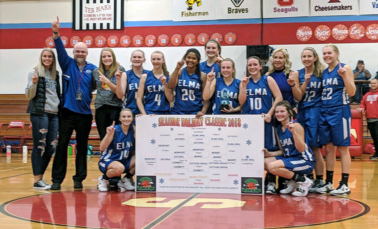 The Elma Eagles pose for a photo after beating Seaside to win the Seaside Holiday Tournament on Saturday in Seaside, Oregon. (Submitted photo)