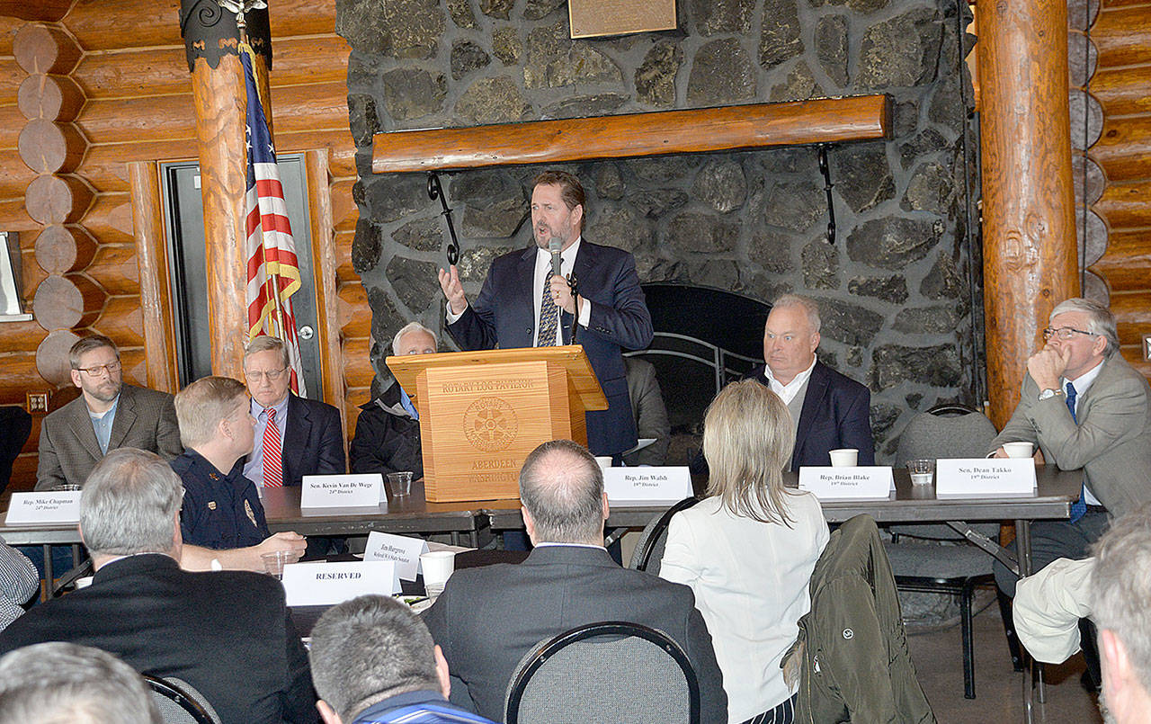 Dan Hammock | Grays Harbor News Group                                Rep. Brian Blake, D-Aberdeen, speaks at the 2019 legislative sendoff Friday. Seated from left are 24th District legislators Rep. Mike Chapman, D-Port Angeles; Rep. Steve Tharinger, D-Port Townsend; and Sen. Kevin Van De Wege, D-Sequim. At right are 19th District Rep. Jim Walsh, R-Aberdeen; and Sen. Dean Takko, D-Longview.