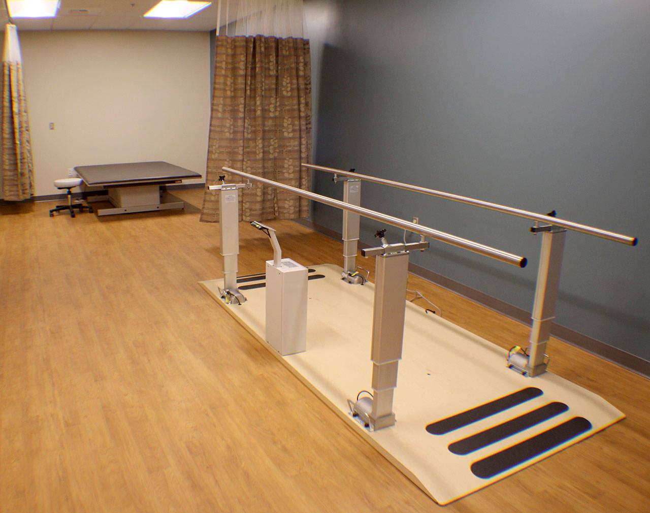 Therapy bars at Summit Pacific Wellness Center can extend telescopically several feet higher to help patients. Photo taken during a celebration of the building’s completion on Jan. 25, 2019, in Elma, Washington. Michael Lang | Grays Harbor News Group