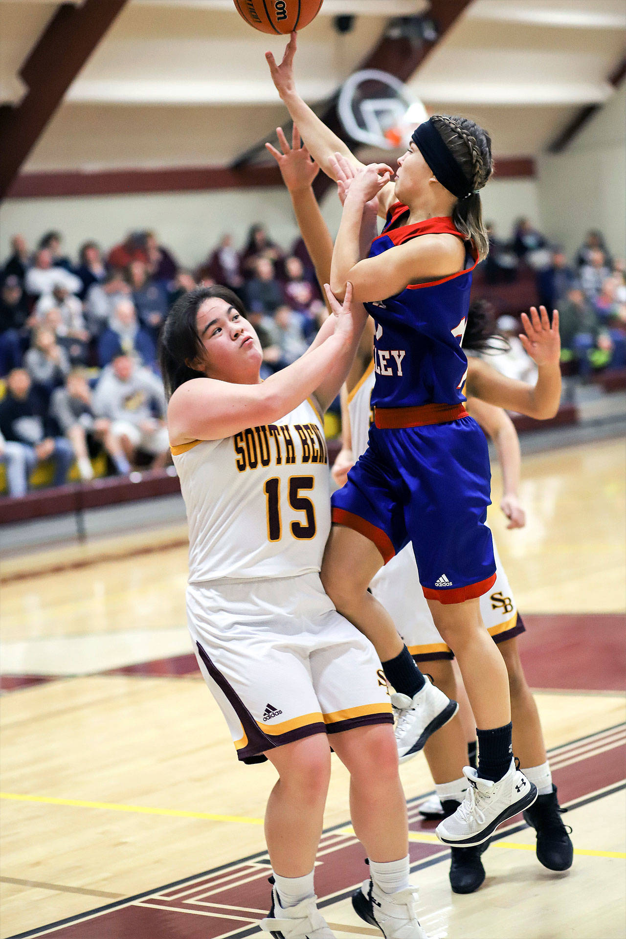 Willapa Valley’s Brooke Friese, right, goes up for a shot against South Bend’s Alise Rohr on Jan. 19. Both the Indians and the Vikings will be playing at the 2B State Tournament, which tips-off Wednesday at the Spokane Arena. (Photo by Larry Bale)