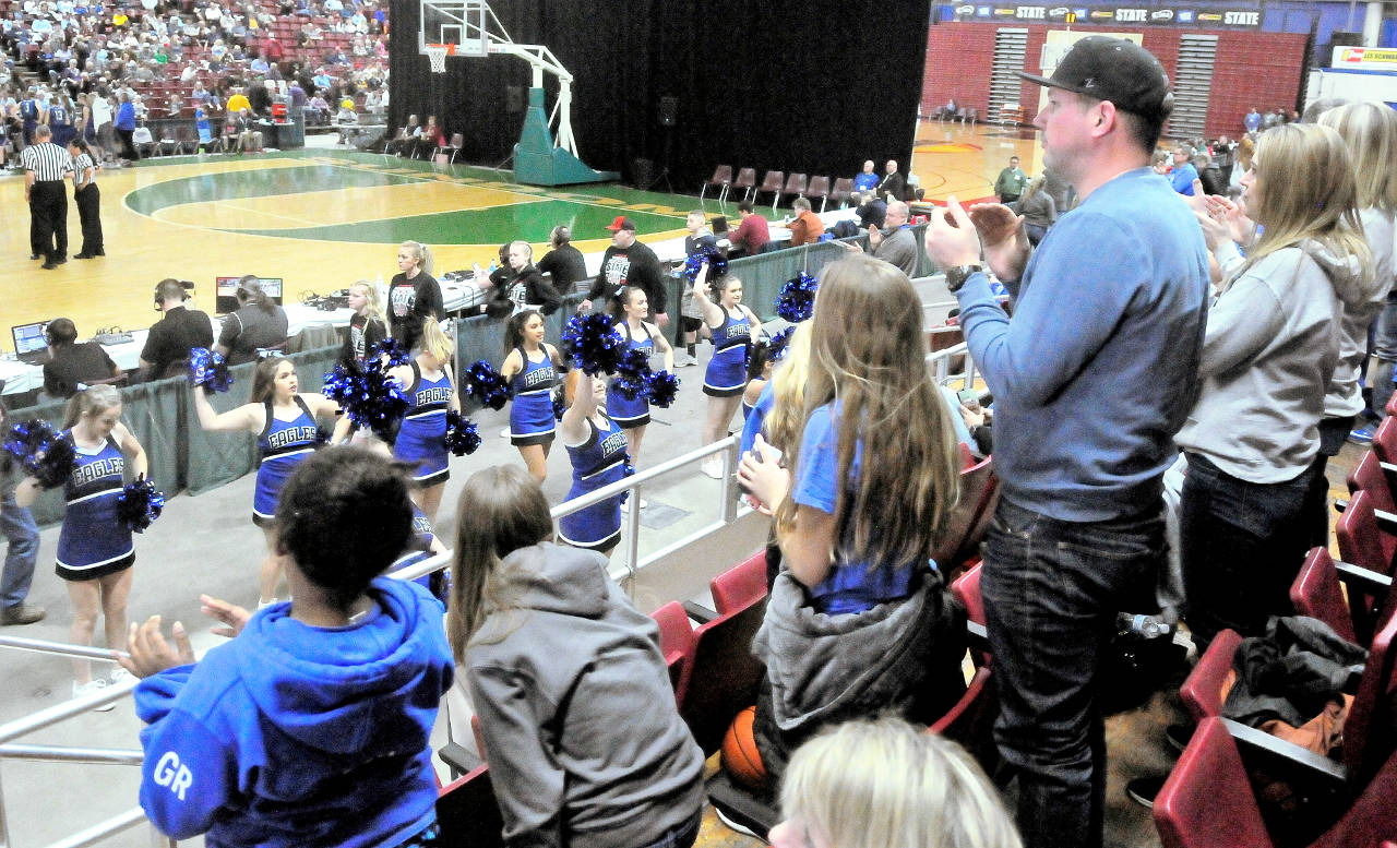 Elma fans cheer along with Elma cheerleaders during a game between Elma and Lynden Christian on Thursday. (Hasani Grayson | Gray Harbor News Group)