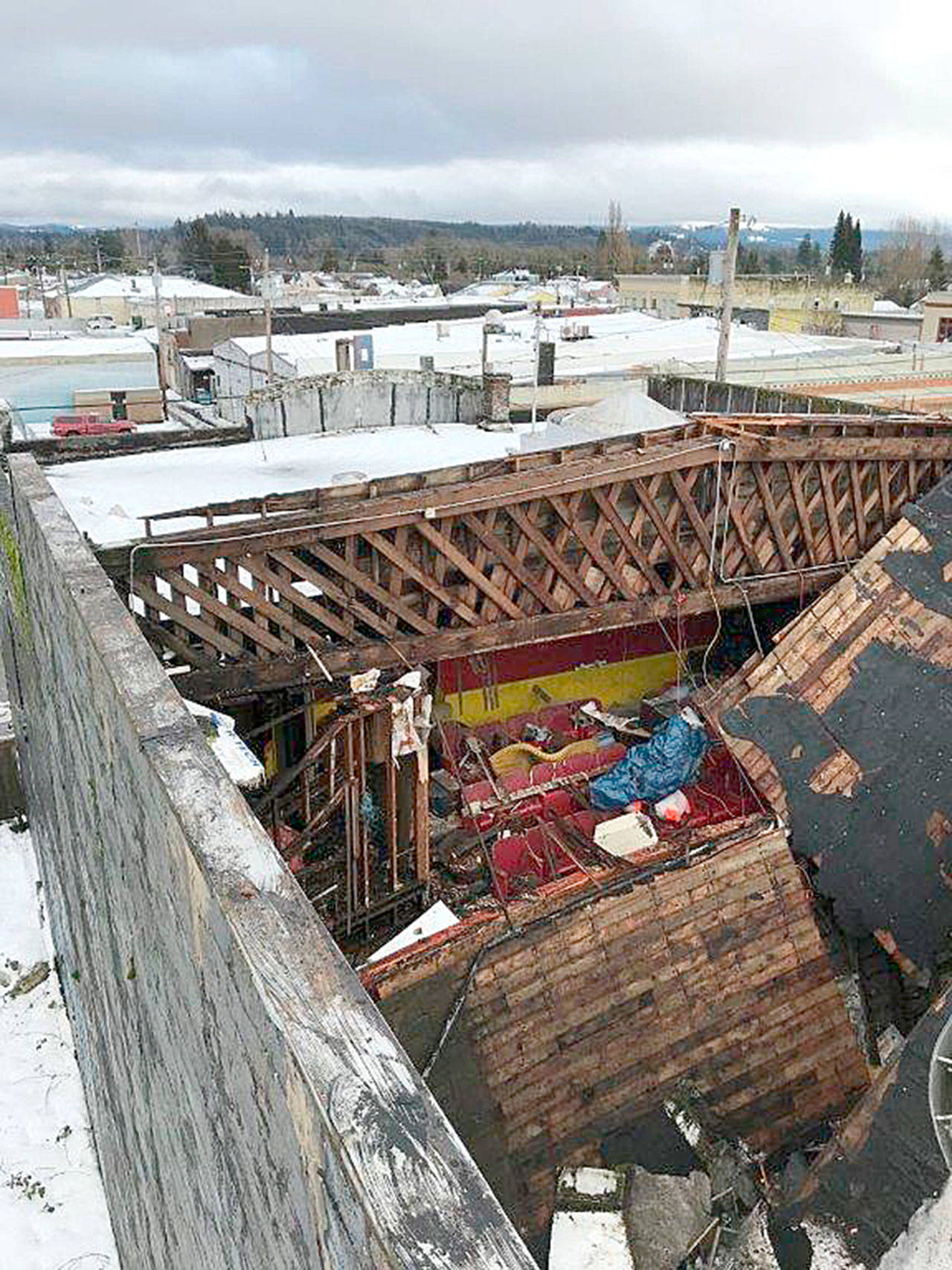 (Courtesy Edna Porter and the city of Elma) The roof of the old Elma Theater has fallen into the building.