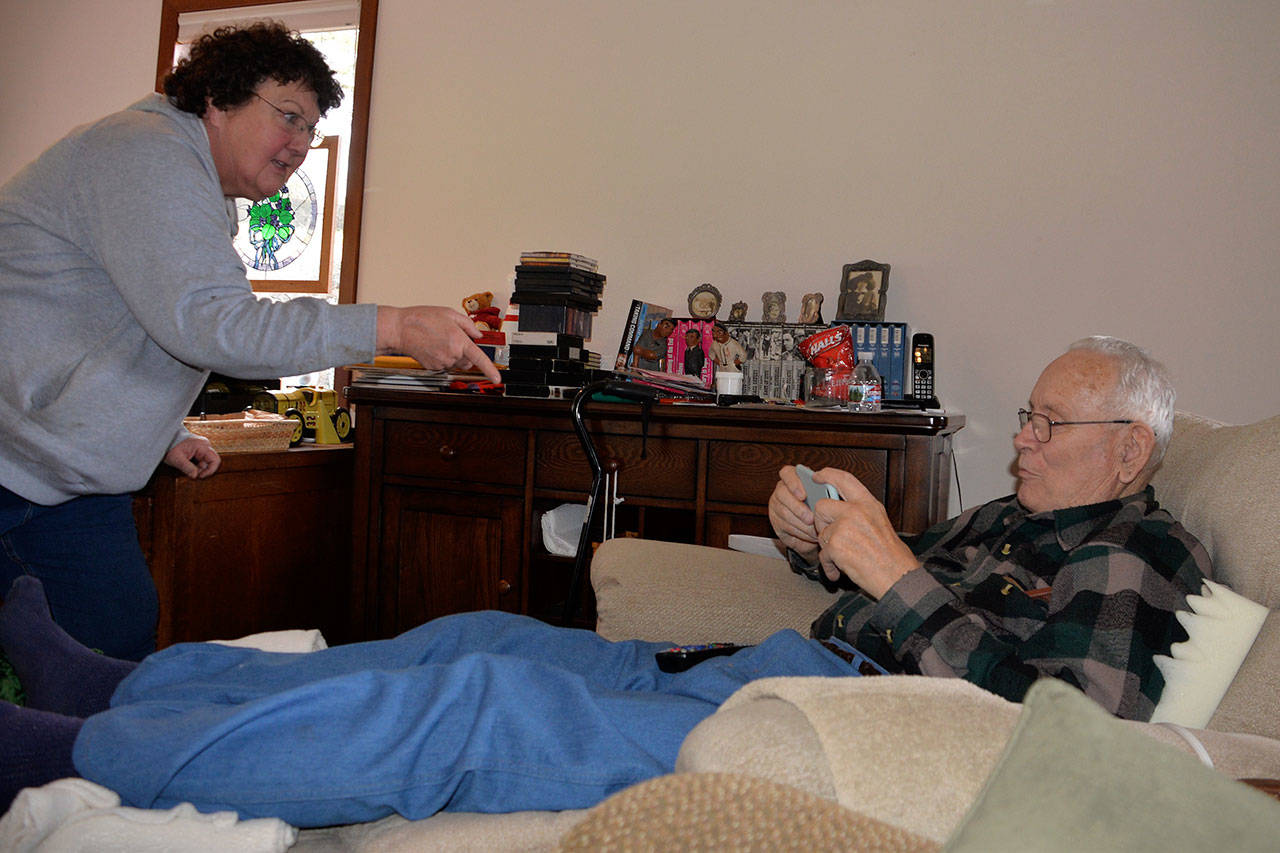 Louis Krauss | Grays Harbor News Group                                Deborah Sturgill, left, talks with Del Brown, grandson of Deputy Sheriff Zack Brown who offered his property to bury Lum You.