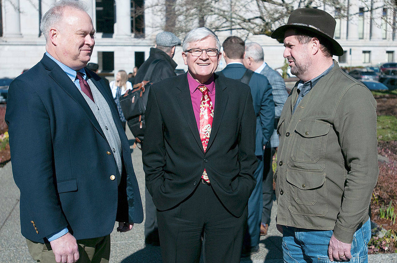 Rep. Jim Walsh, a Republican from Aberdeen (from left) and Sen. Dean Takko (D-Longview) each voted against efforts in the legislature to allow Washington to adopt daylight saving time year-round. Rep. Brian Blake (D-Aberdeen) and most other regional lawmakers voted for the House bill. Photo by Sean Harding | Washington Newspaper Publishers Association