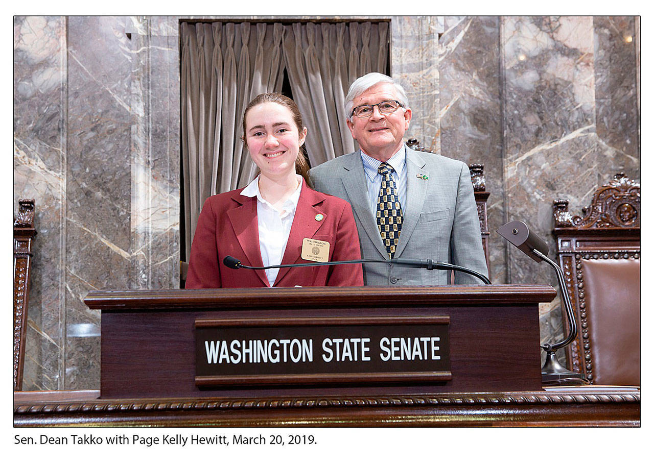 Kelly Hewitt, left, poses for a picture with Sen. Dean Takko on March 20, 2019, in Olympia. Kelly, 15, worked as a page at the Capitol. She was sponsored by Takko. Submitted photo