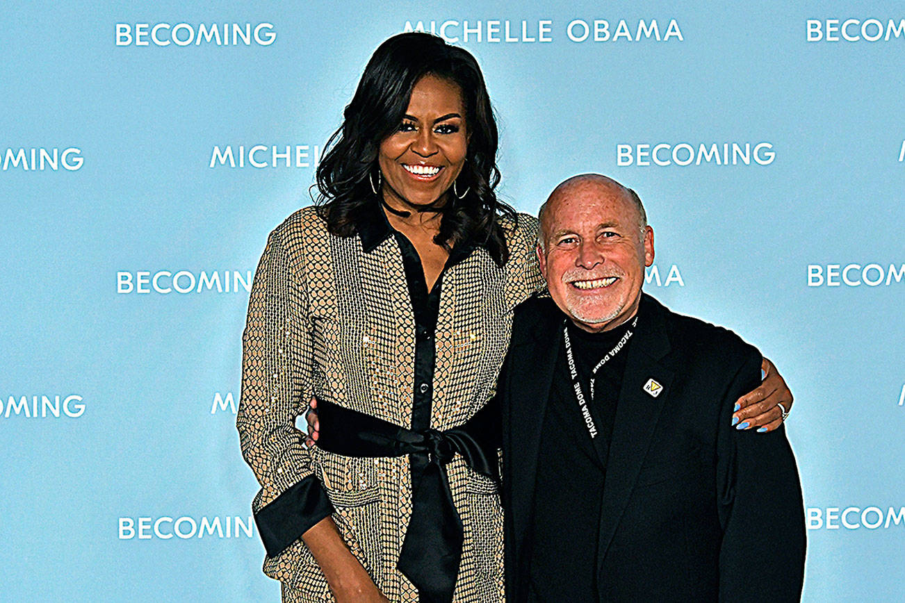 Cosmopolis photographer meets Michelle Obama at Tacoma event