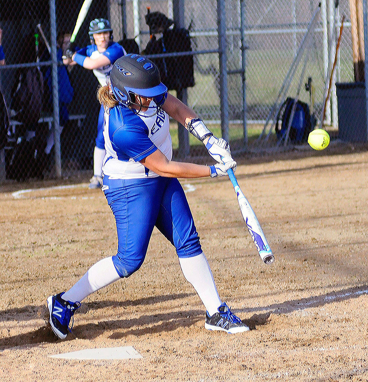 Elma’s Chloe Velasco hits a double in the fifth inning against Pe Ell-Willapa Valley on Thursday. (Hasani Grayson | Grays Harbor News Group)
