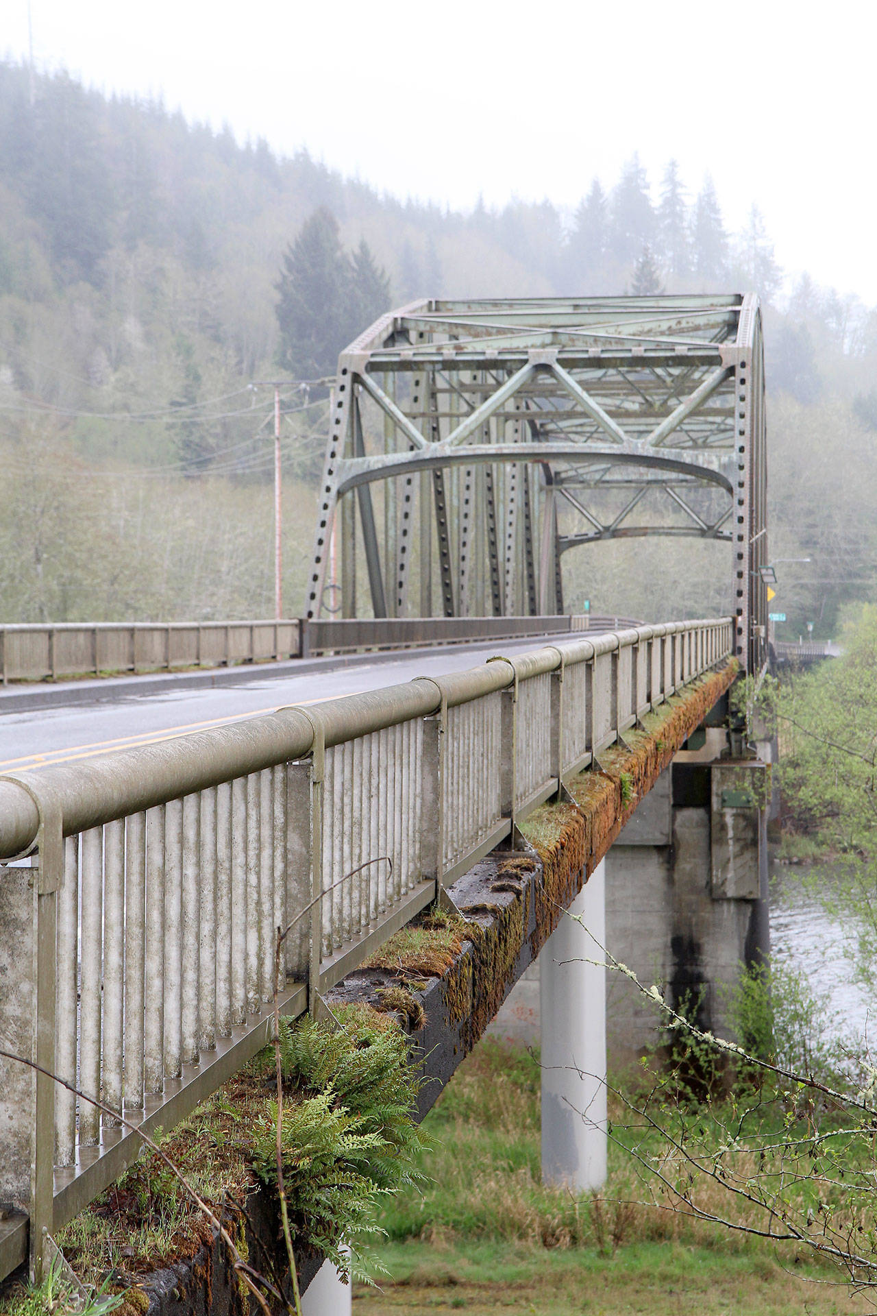 Beginning next week, state Department of Transportation personnel will lower the speed limit along state Route 107 in preparation for painting the Chehalis River Bridge south of Montesano. The WSDOT also will replace the wooden guard rails south of the bridge. Michael Lang | Grays Harbor News Group