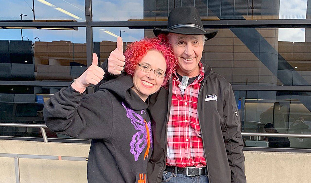 Sara Johnson (left) and her father, Bob Leslie, pose for a picture before heading to Chicago to begin the steps necessary to have experimental stem cell therapy to treat her multiple sclerosis. (Photo courtesy Sara Johnson)