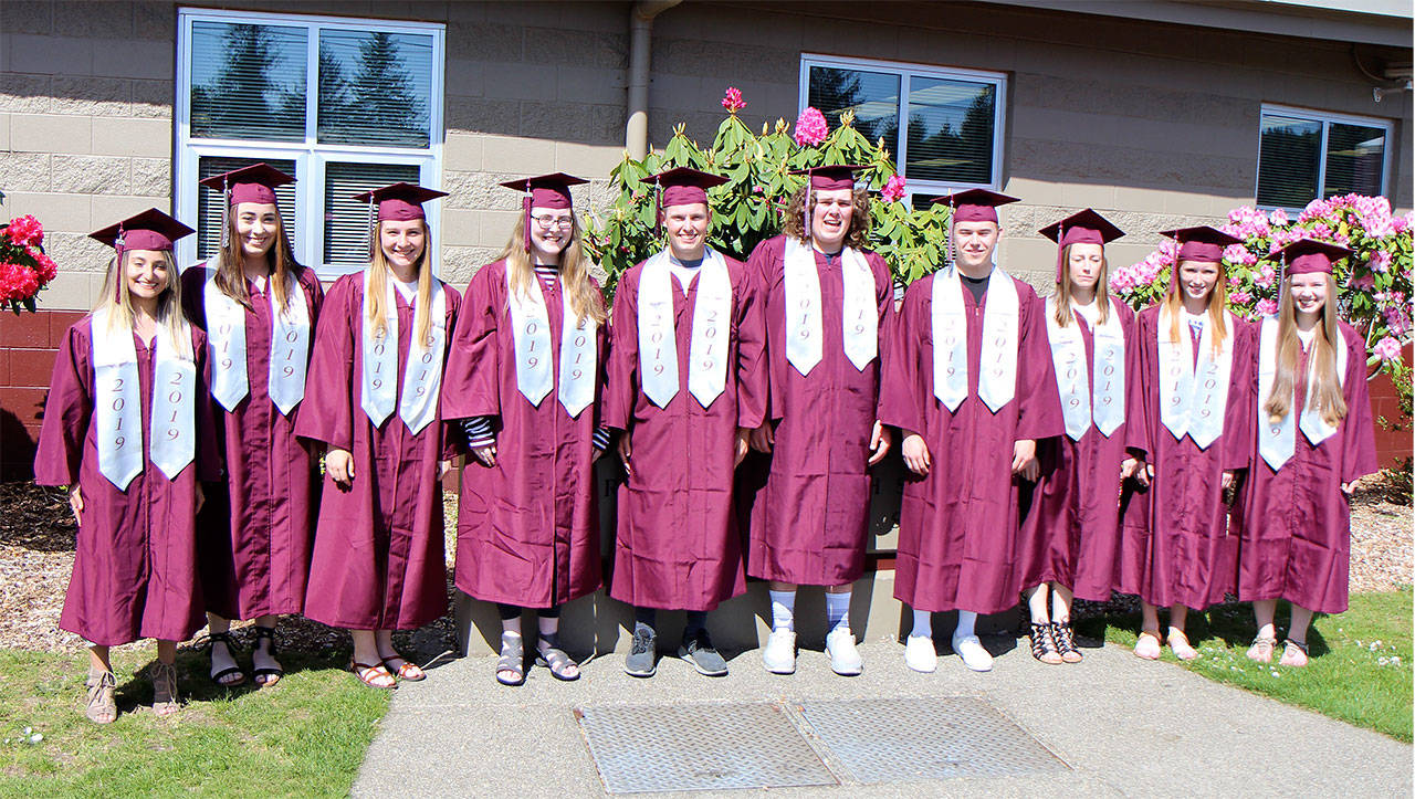 Ten of the 11 Top 10 students in the Montesano High School Class of 2019 pose Tuesday, May 7, outside the school in Montesano. From left are Marisol Cisneros-Garcia, Claire Elise Corbett, Kaitlyn Granstrom, Hero Winsor, Pyson Parker, Gage Daniels, Mason W. Lutz, Matti Ekerson, Glory Grubb, and Savannah Dilley. Not pictured is Evan Bates. (Michael Lang | Grays Harbor News Group)