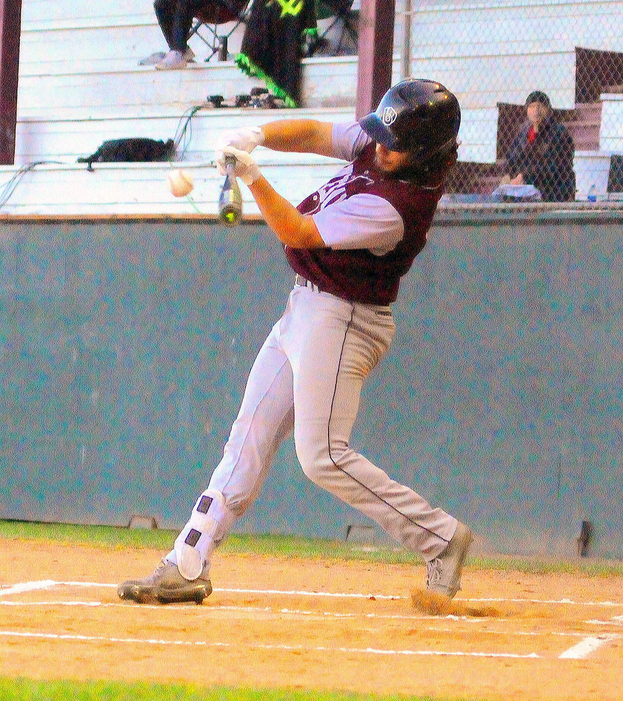 Montesano’s Teegan Zillyet hits a double into the left centerfield gap against La Center on Monday at Olympic Stadium. (Hasani Grayson | Grays Harbor Newsgroup)