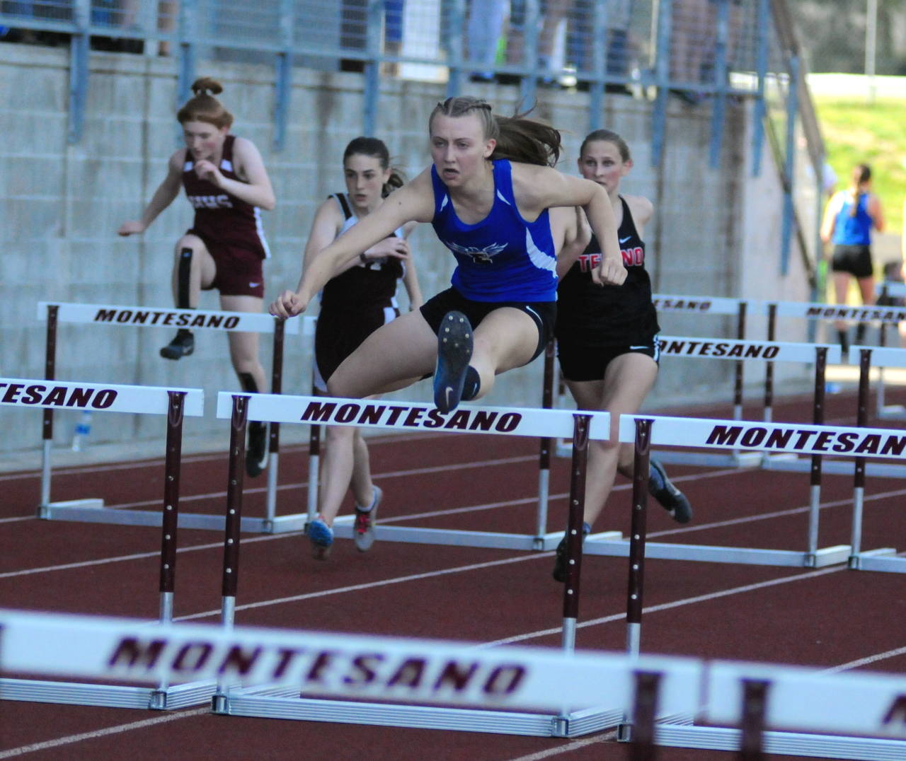 Elma’s Jillian Bieker leads the field en route to a victory in the girls 100 meter hurdles on Friday at Montesano High School. Bieker won the race with a time of 16.35. (Ryan Sparks | Grays Harbor News Group)