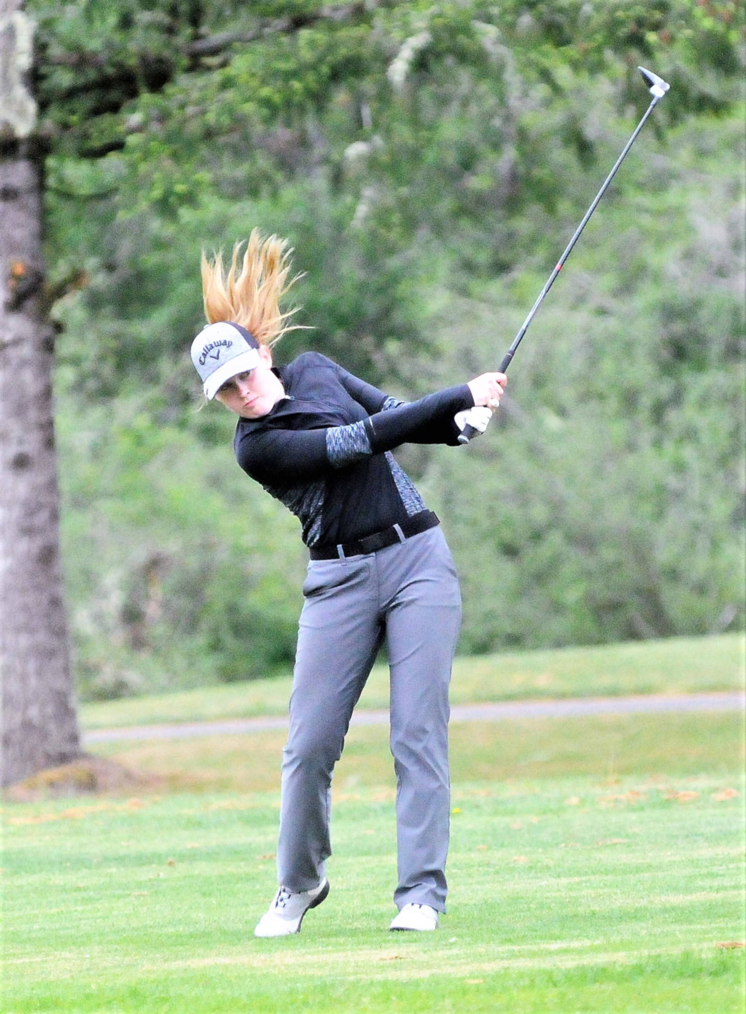 Montesano’s Mylaina Parker hits a shot on the 17th hole at the SWW1A District Golf Tournament on Tuesday. Parker finished the two-day tournament atop the leaderboard with a score of 164. (Hasani Grayson |Grays Harbor News Group)