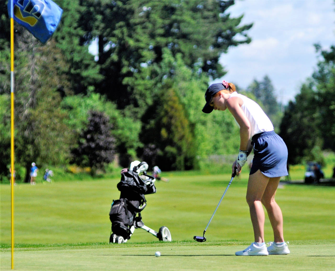 Montesano’s Glory Grubb putts from the 18th green in the second round of the 1A State Golf Tournament on Wednesday at Tumwater Valley Golf Club. Grubb shot an 86 to finish in 10th place. (Hasani Grayson | Grays Harbor News Group)