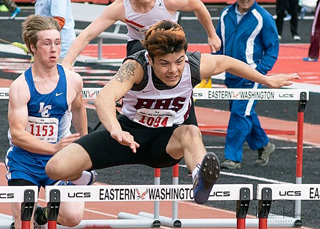 Submitted Photo                                 Hoquiam’s Antonio Garcia competes in the 110-meter hurdles at the 1A State Track and Field Championships in May.